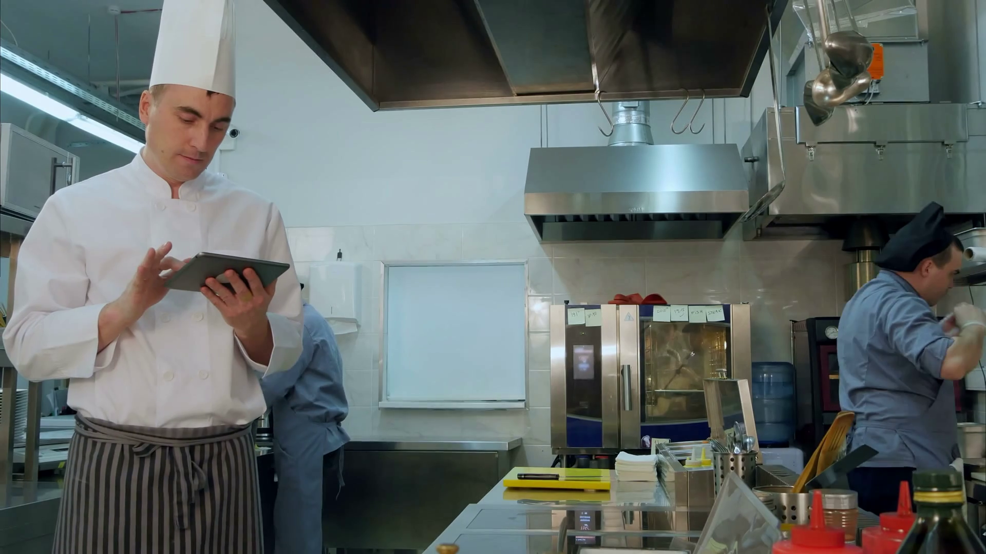 Chef Checking Up Recipes On Digital Tablet Stock Footage SBV-312567007 ...