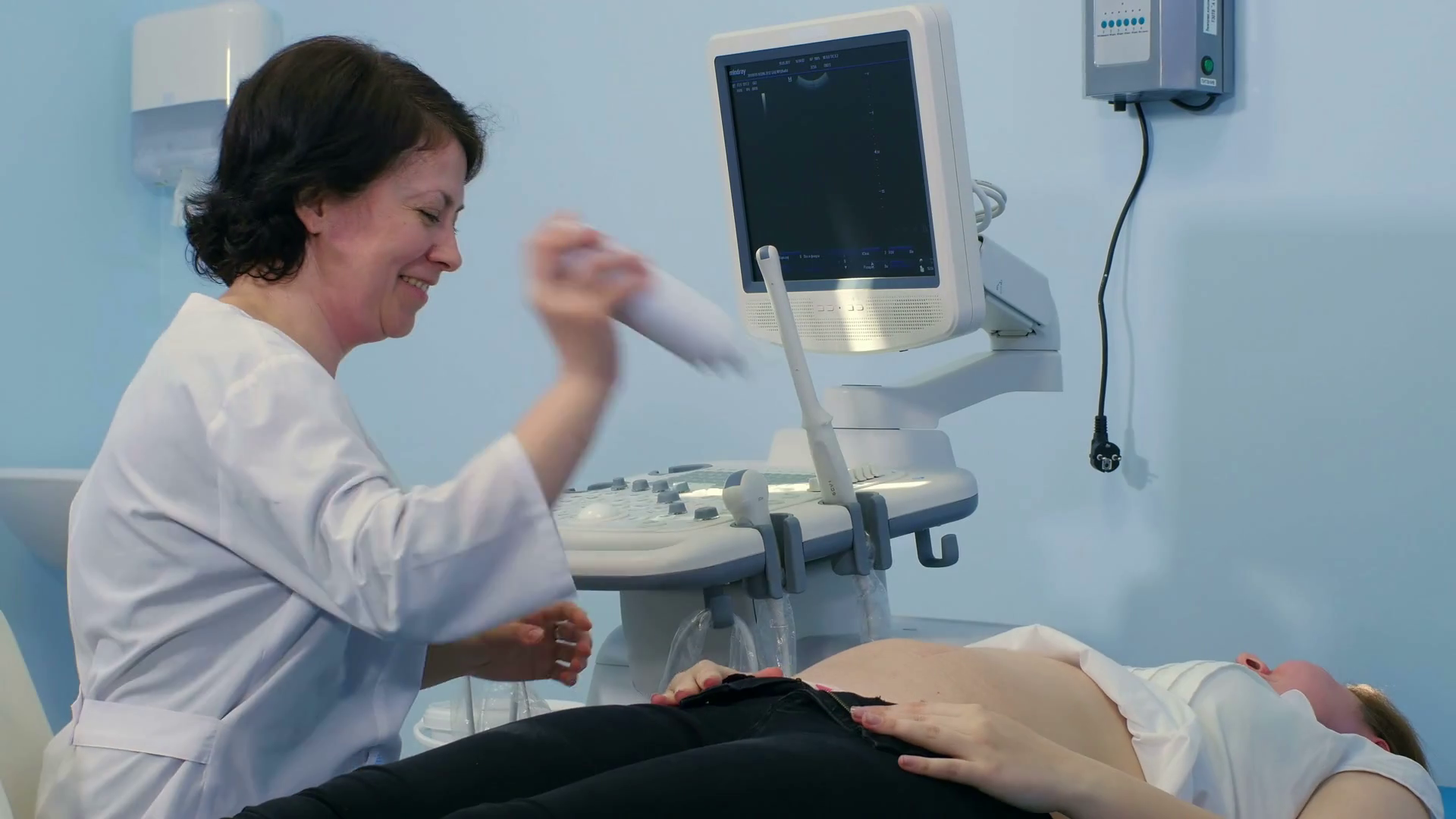 Female Doctor Putting Gel On Patient Stomach Stock Footage SBV