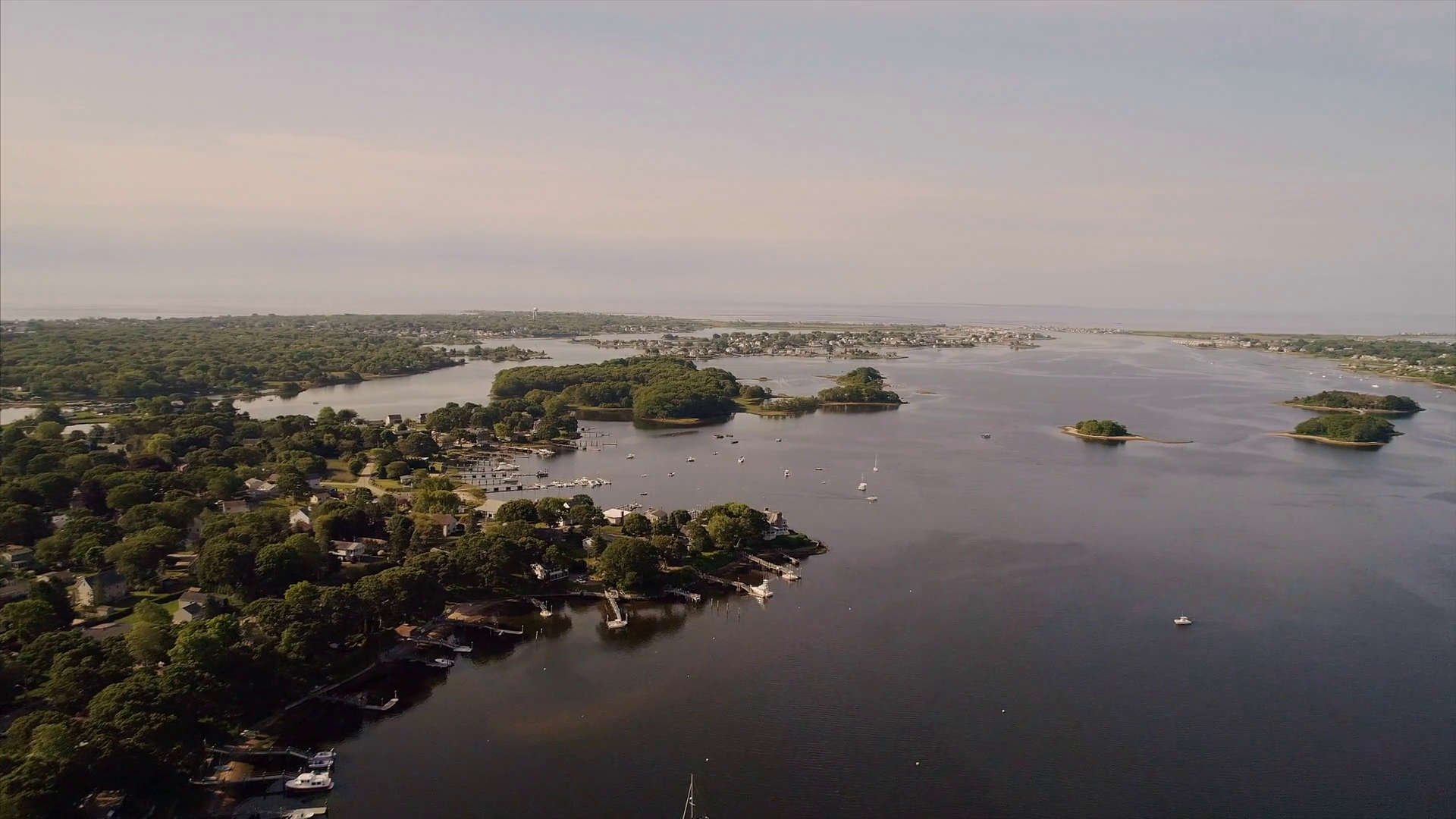 View of houses near water Stock Video Footage 0016 SBV346399185