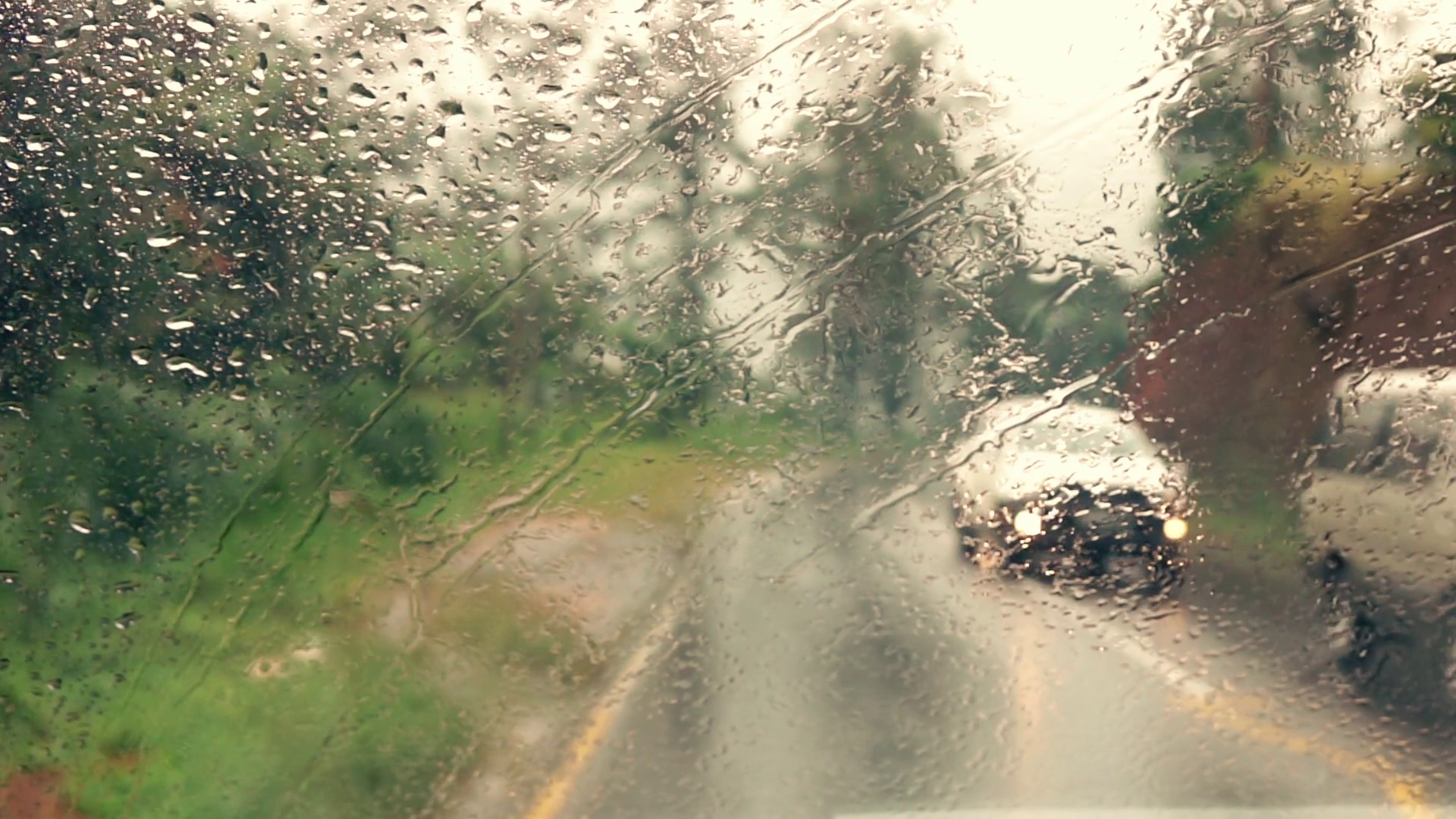 Car driving in the rain, super slow motion Stock Video Footage
