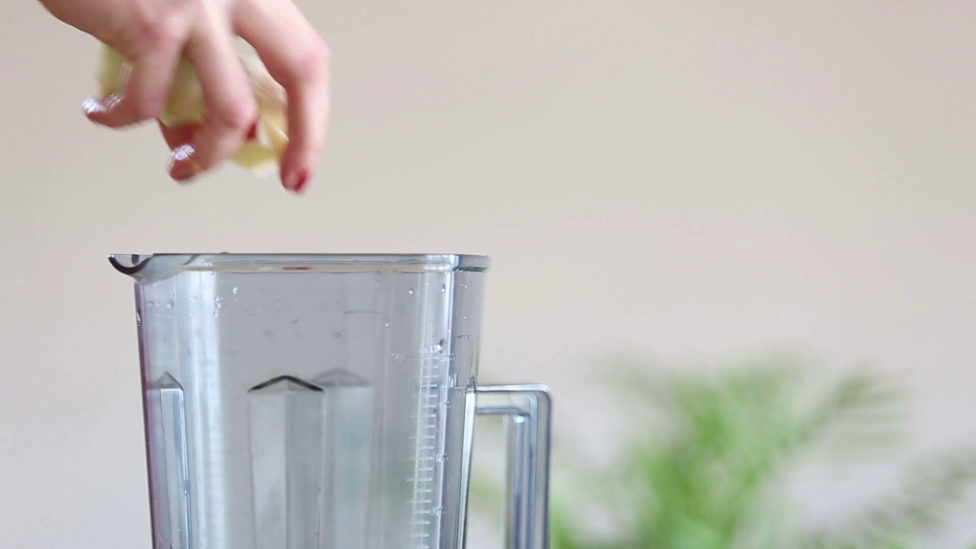 Closeup of woman hand putting fruits in blender Stock Video Footage 00