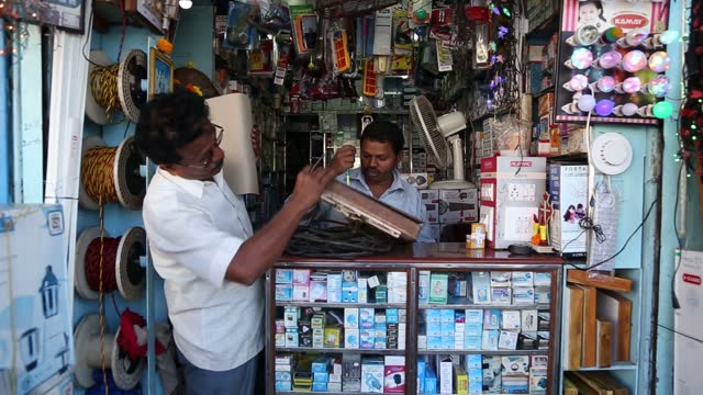 Male Confident Asian Online Shopkeeper Talking With Customers In Live ...