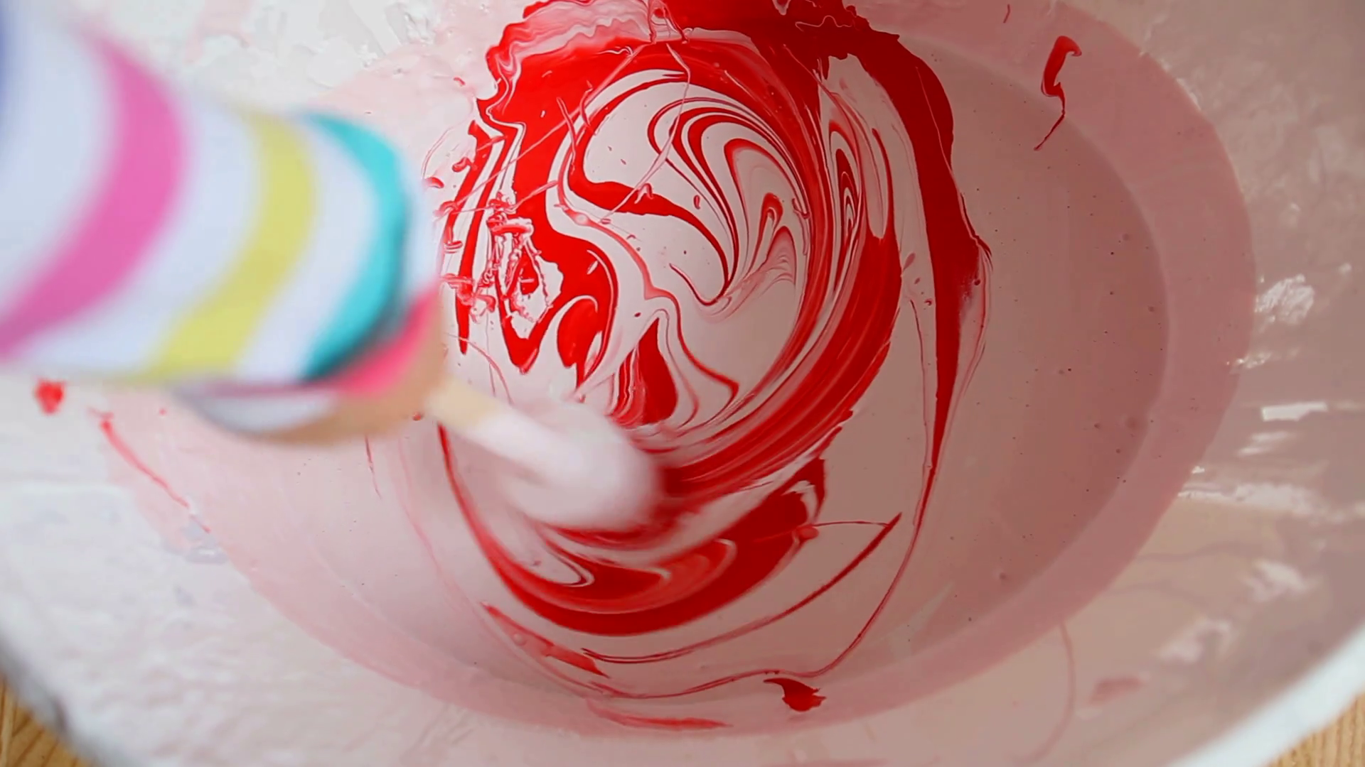 Mixing Red Paint In Bucket Of White Paint Stock Footage SBV301465725