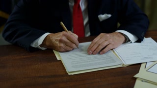 President Trump Signing Executive Order In Oval Office