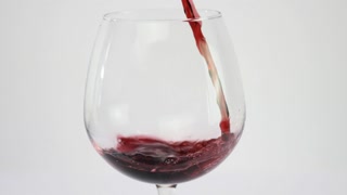 Slow Motion Pouring Wine On White Background