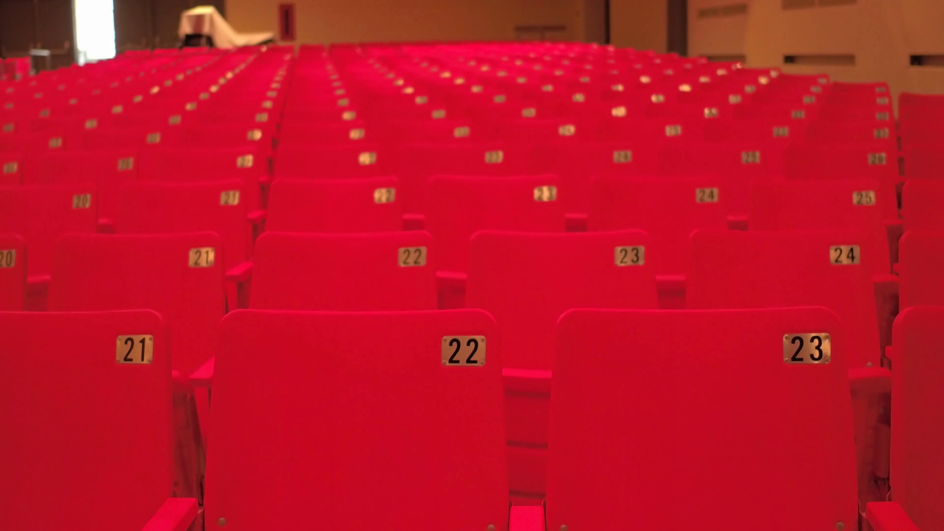 Dolly In To Theatre Chairs In Cinema Stock Footage SBV347716811