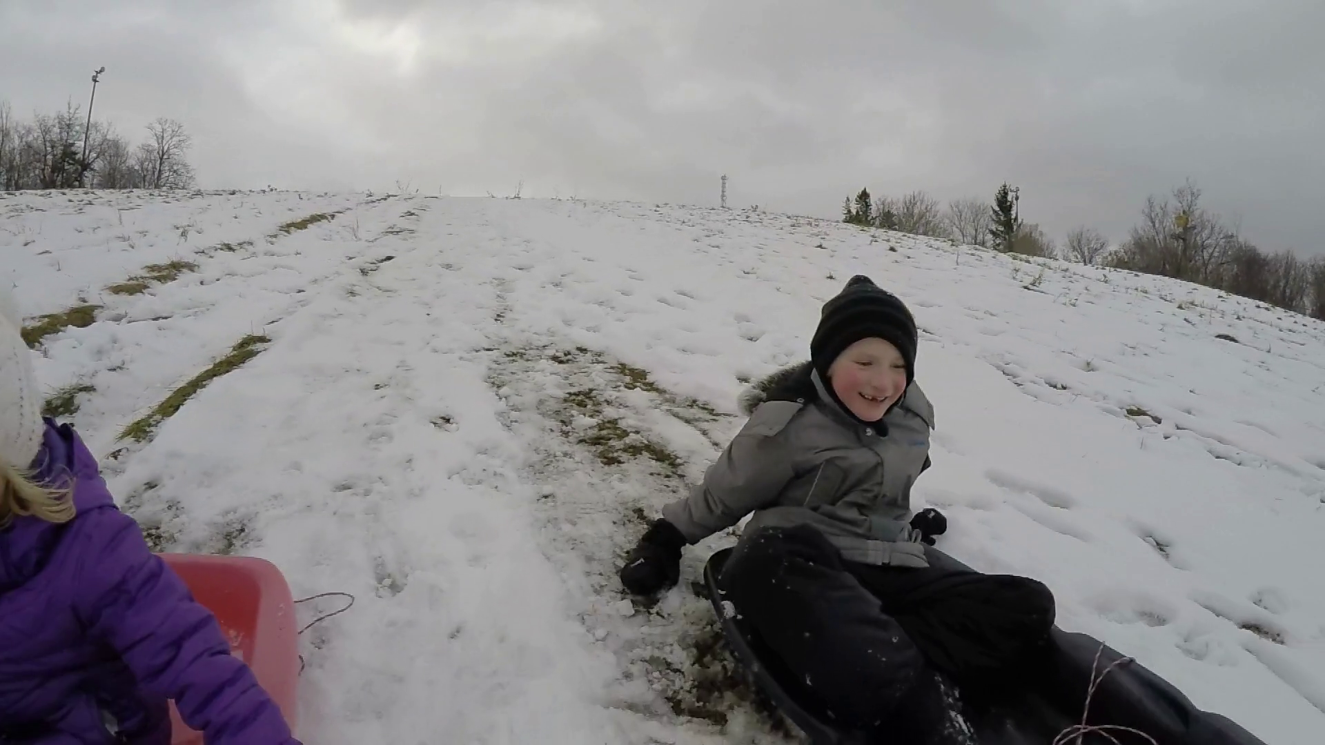 Family Winter Sliding Brother Sister Racing Stock Footage SBV347718671