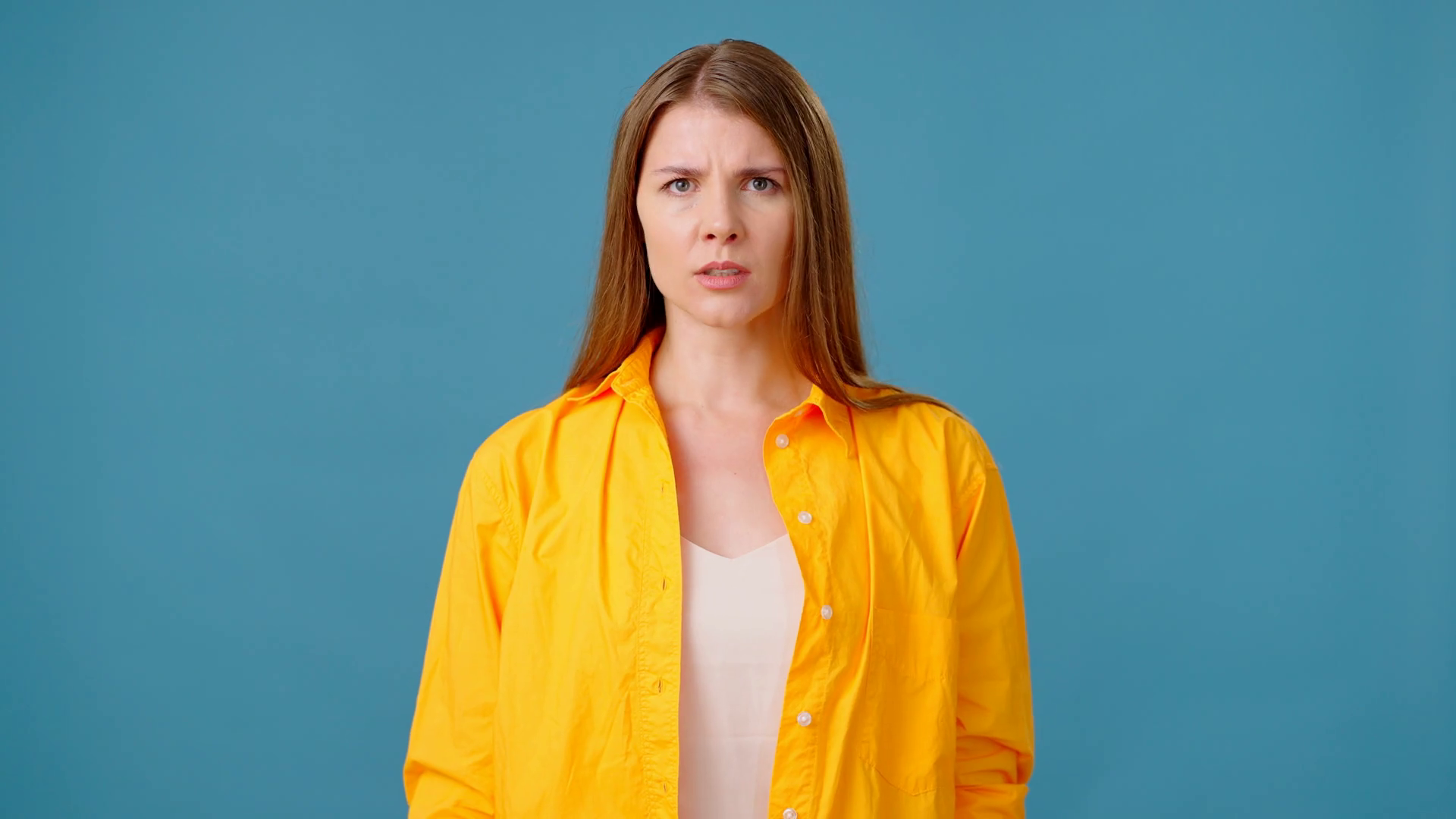 Exasperated Woman Grabs Ears Annoyed With Stock Footage SBV-348686985 ...
