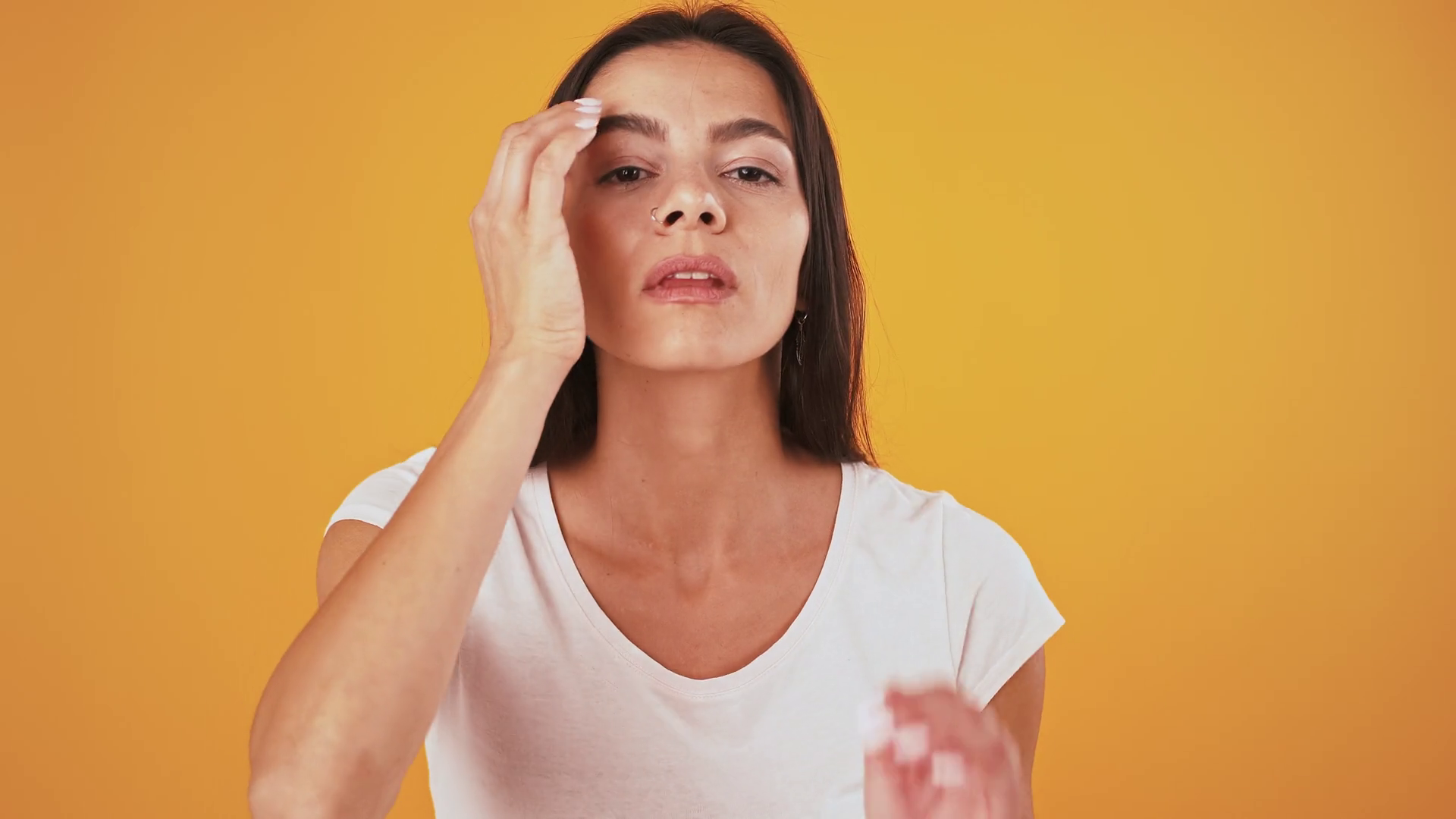 Female smiling, snapping fingers, pointing at you and winking. Posing