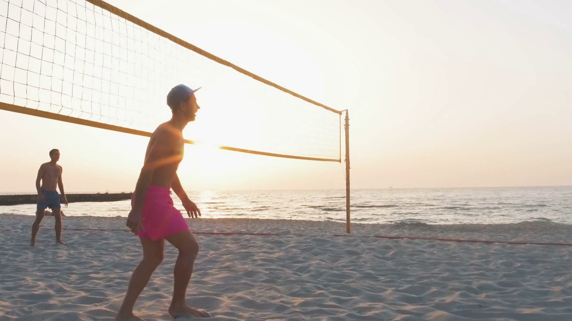 Volleyball player kicking ball, slow motion Stock Video Footage 0019