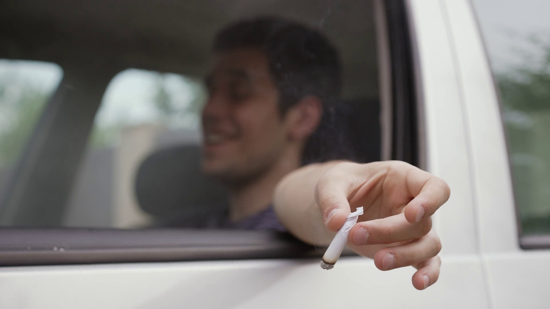 Man smokes weed in the car Stock Video Footage 0026 SBV346564821 Storyblocks