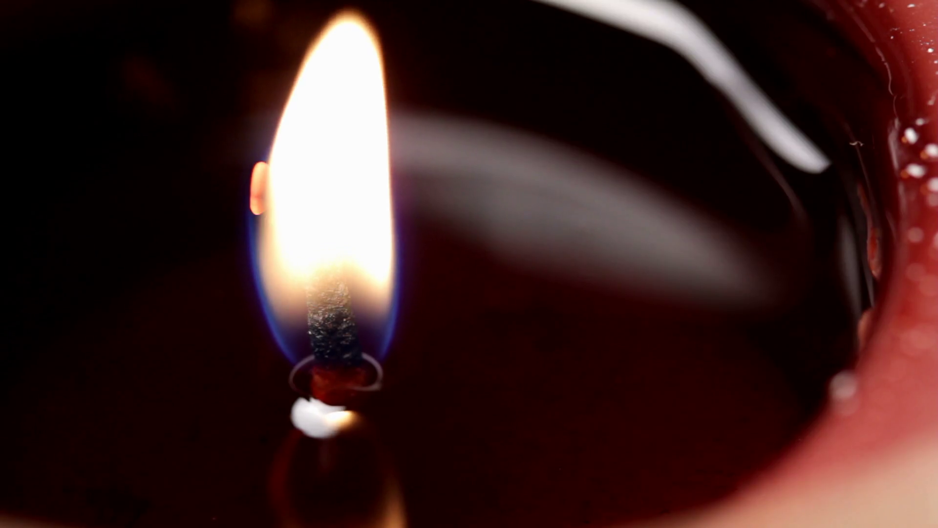 Candle Flame burning macro Stock Video Footage Storyblocks