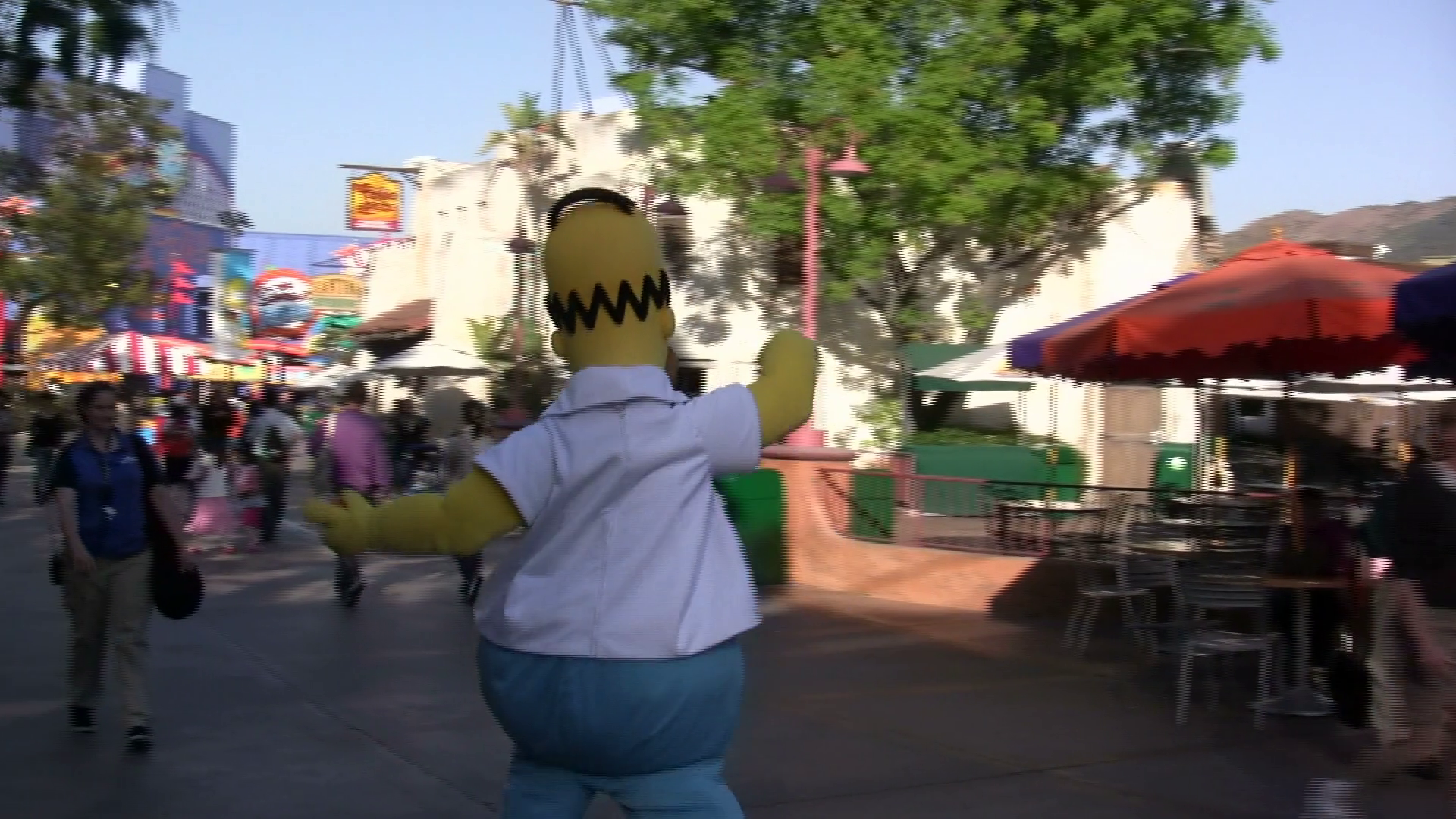 Homer Simpson Walking Through Park Stock Footage SBV301054954