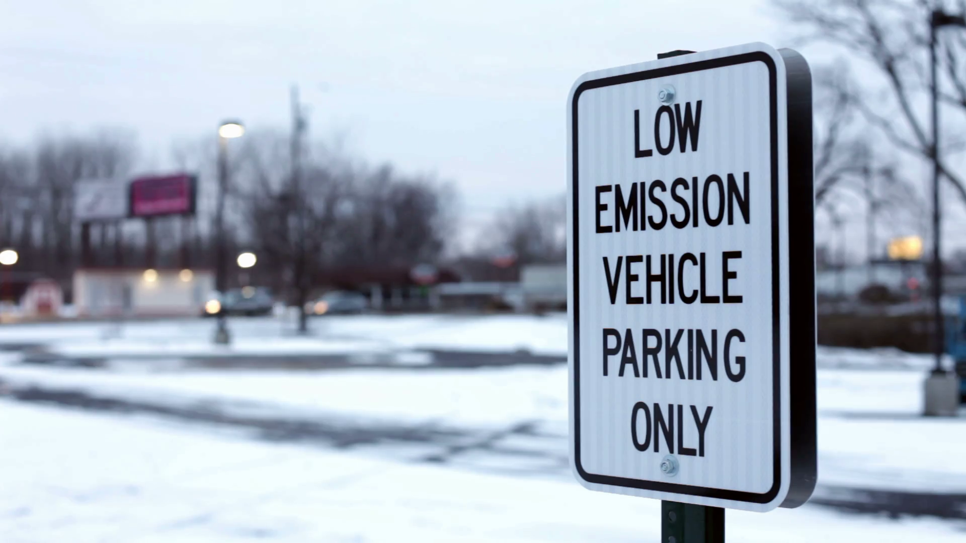Low emissions vehicle parking only sign Stock Video Footage 0020 SBV