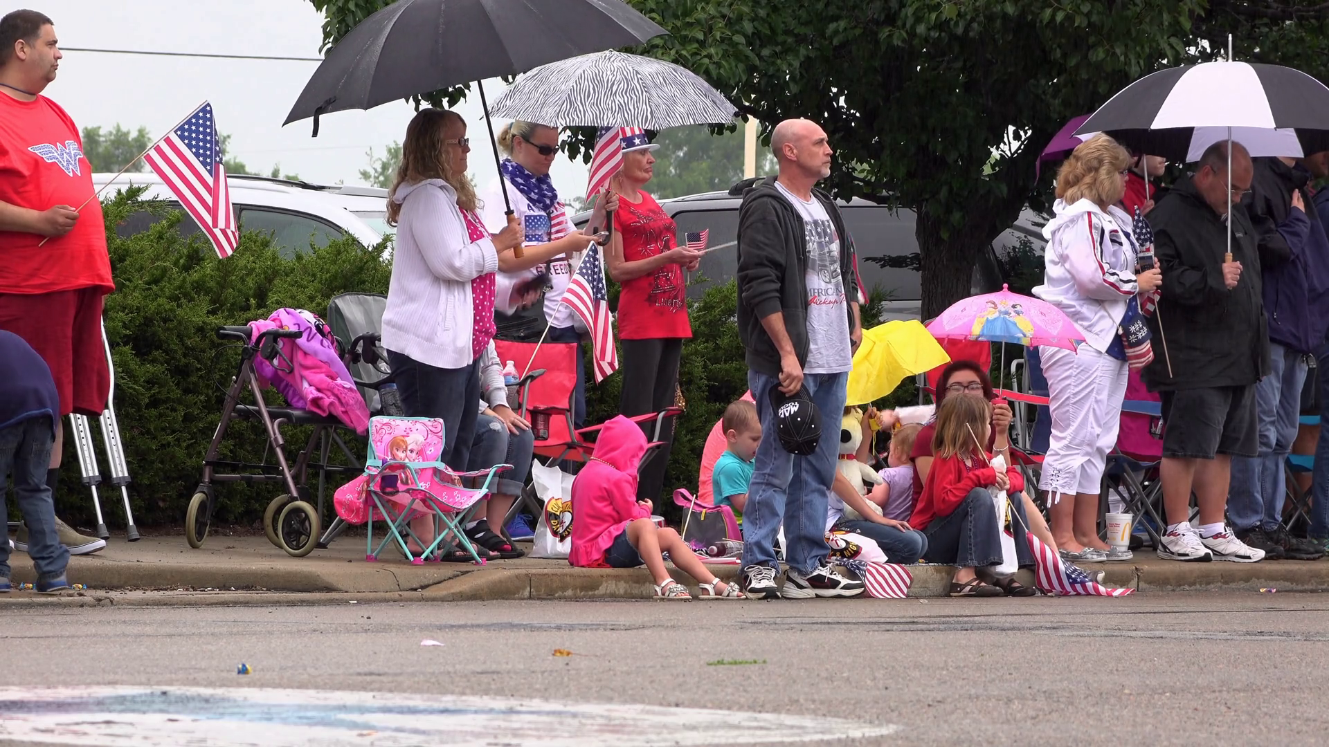 People along Fairborn Ohio parade route 4k Stock Video Footage 0016