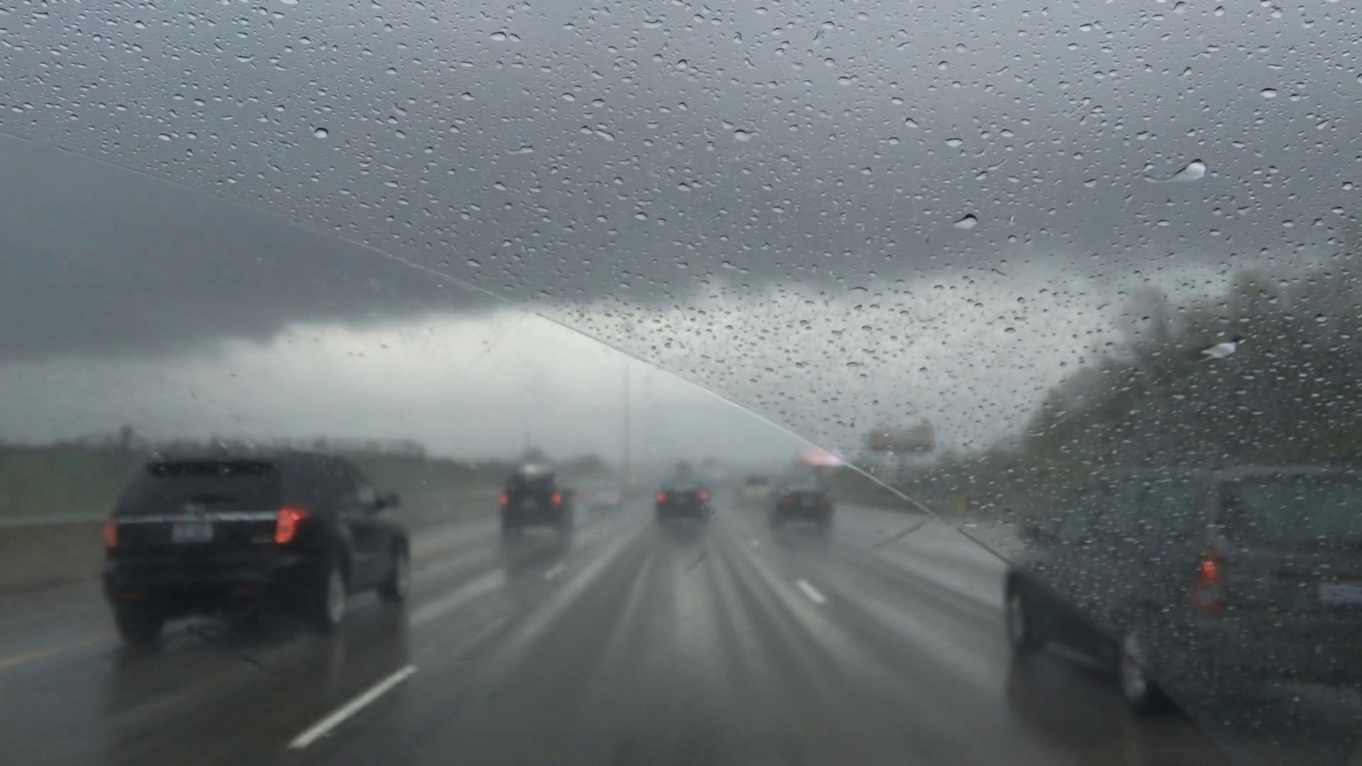Rainy Stormy Day Driving Down Highway In Car Stock Footage SBV