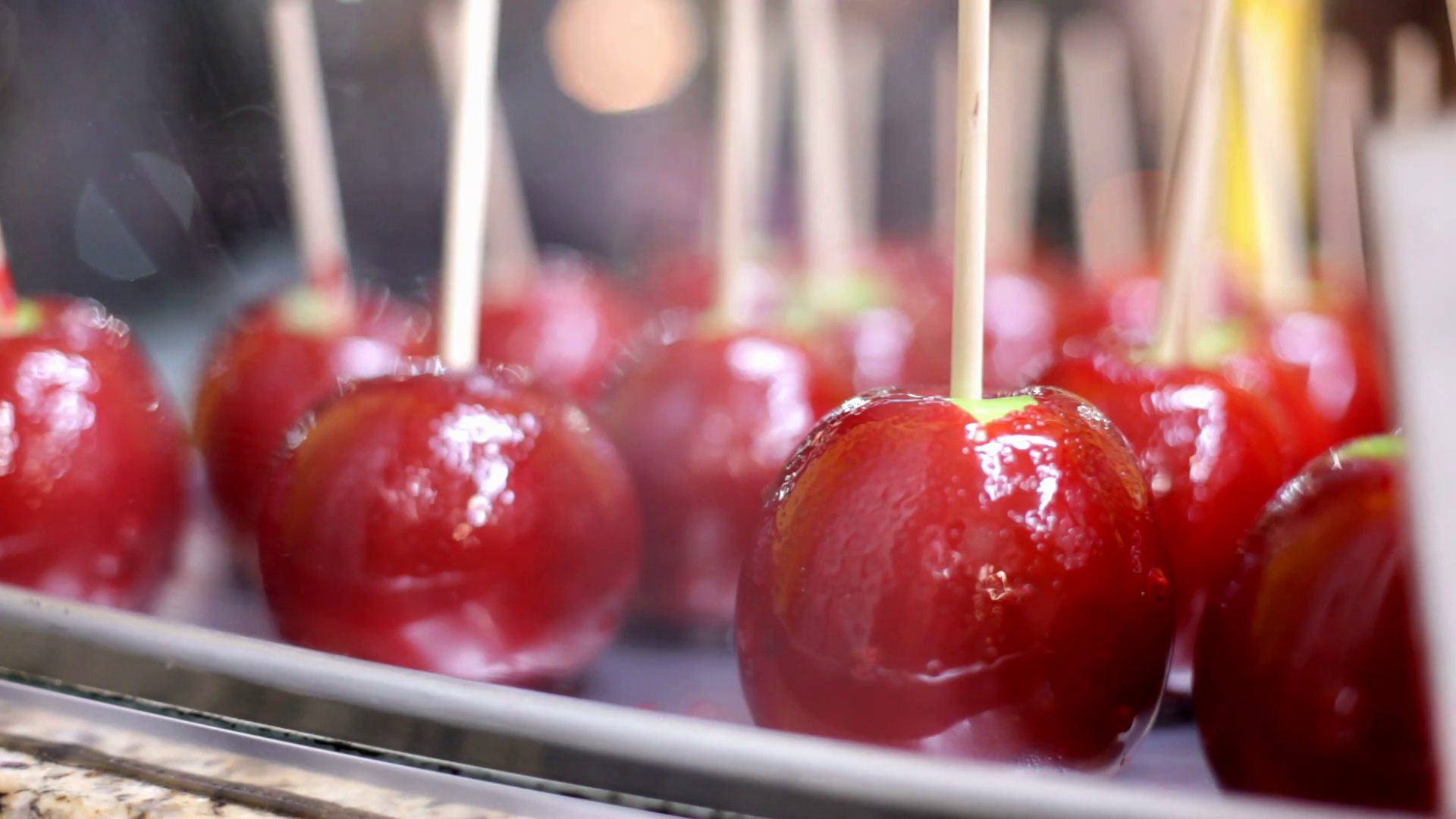 Red candy apples for sale Stock Video Footage 0011 SBV301105716