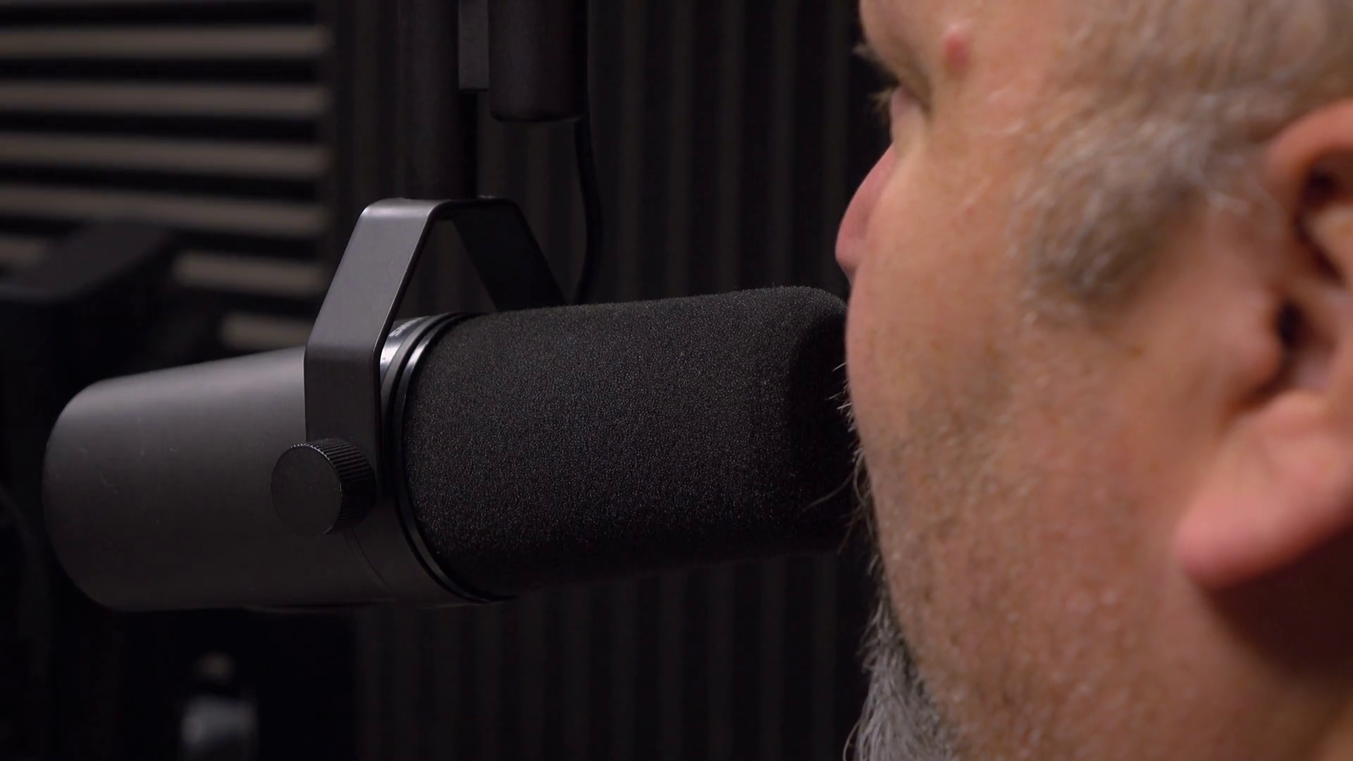 Talk show radio host in studio talking into microphone 4k Stock Video Footage Storyblocks