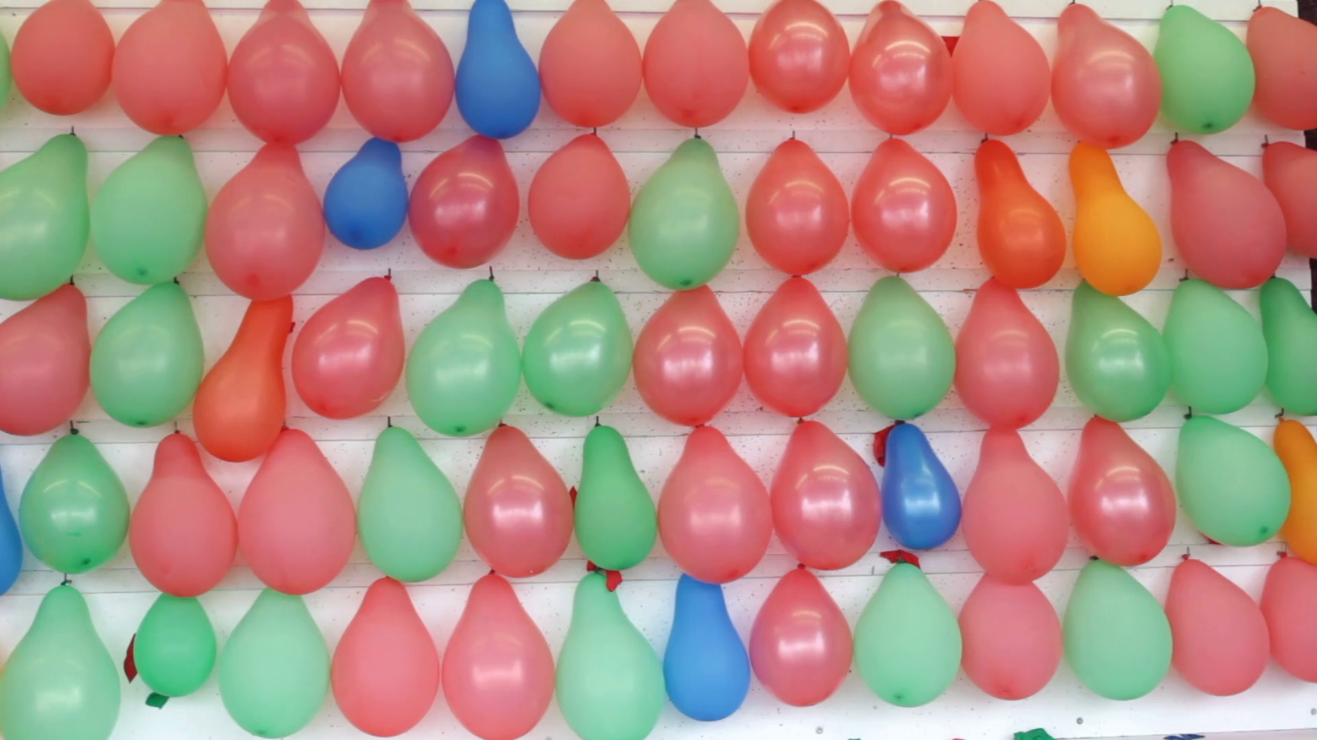Throwing dart at balloon in carnival game Stock Video Footage 00:10  SBV-301110004 - Storyblocks