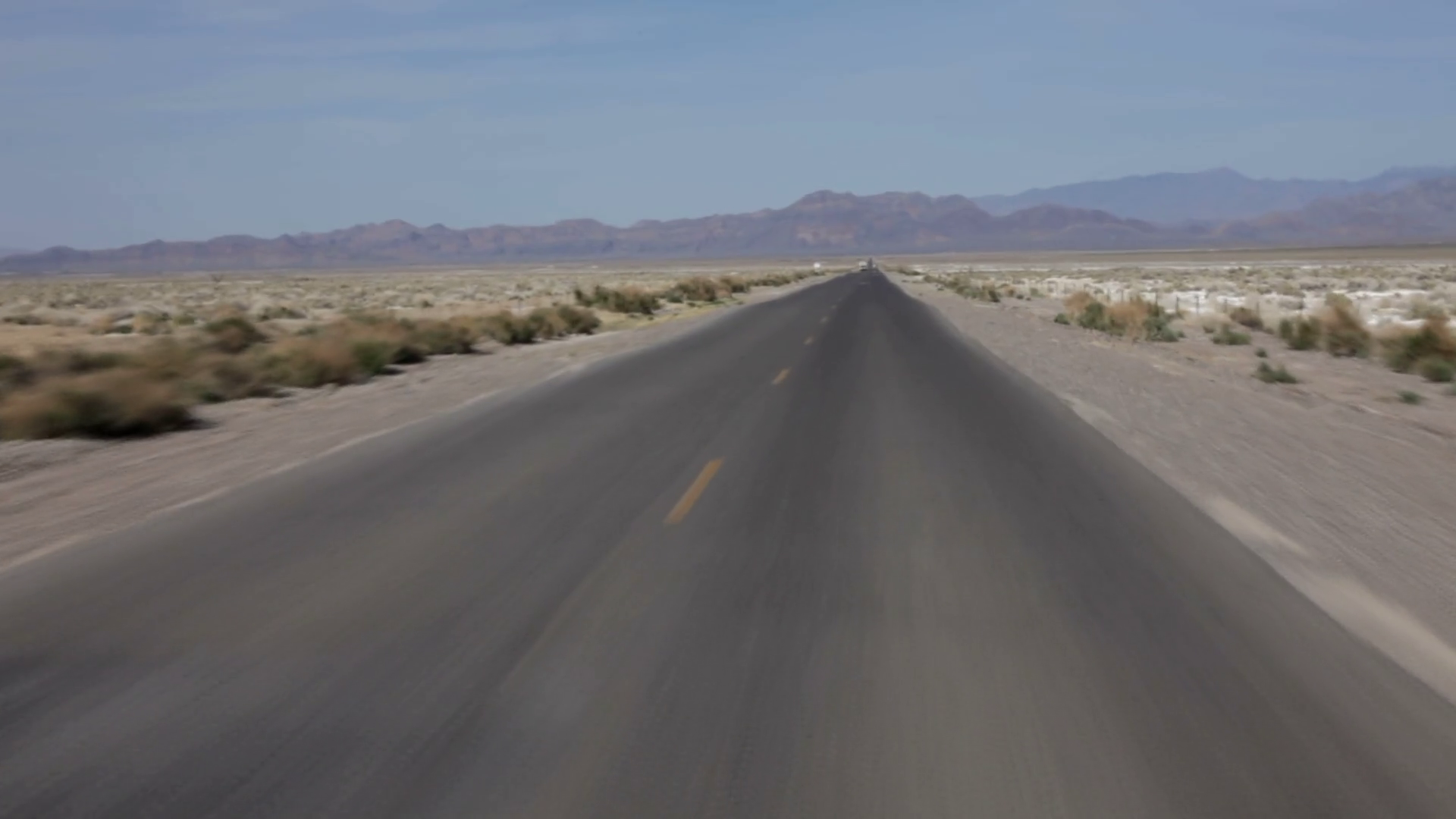 Time lapse of driving down desert road POV Stock Video Footage 0015