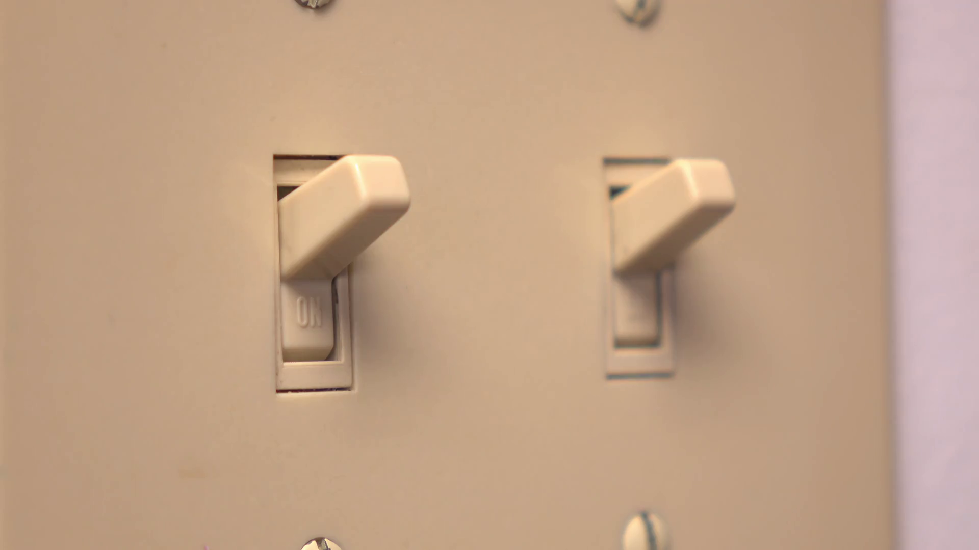 Close Up Of Light Switch Being Flipped On Stock Footage SBV347359398