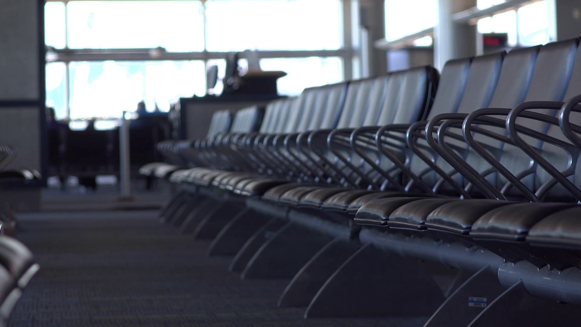 Empty boarding area seats at airport terminal 4k Stock Video Footage