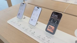 iPhone 17 phones displayed at store 4k