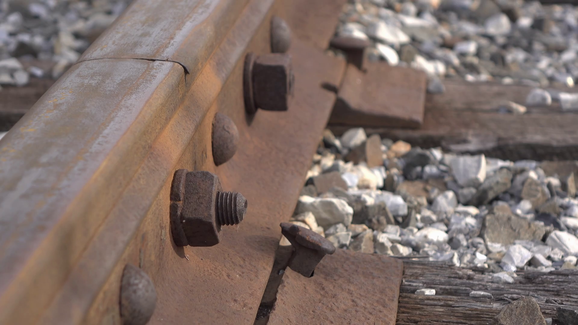 Old rusted railroad track hardware on track 4k Stock Video Footage 00