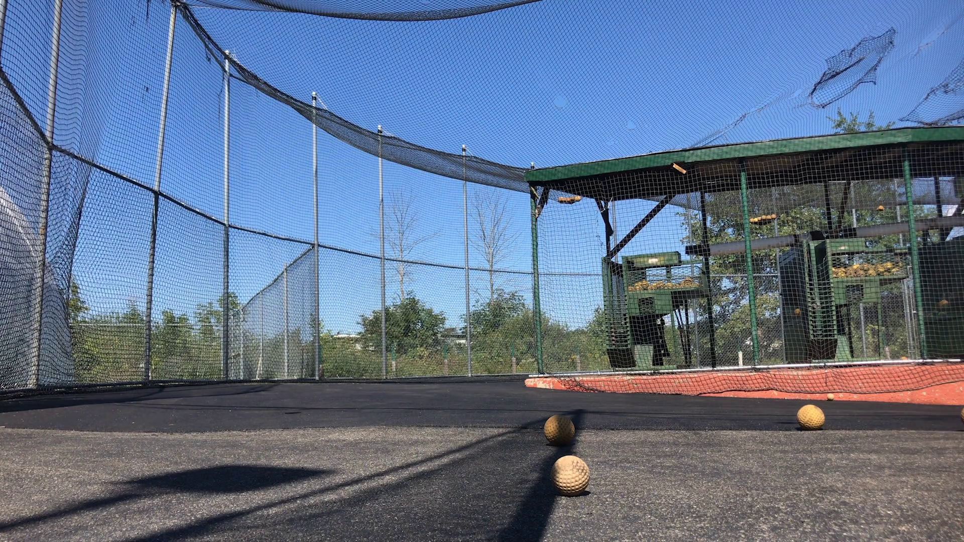 Pitching Machine At Batting Cages Stock Footage SBV333073225 Storyblocks