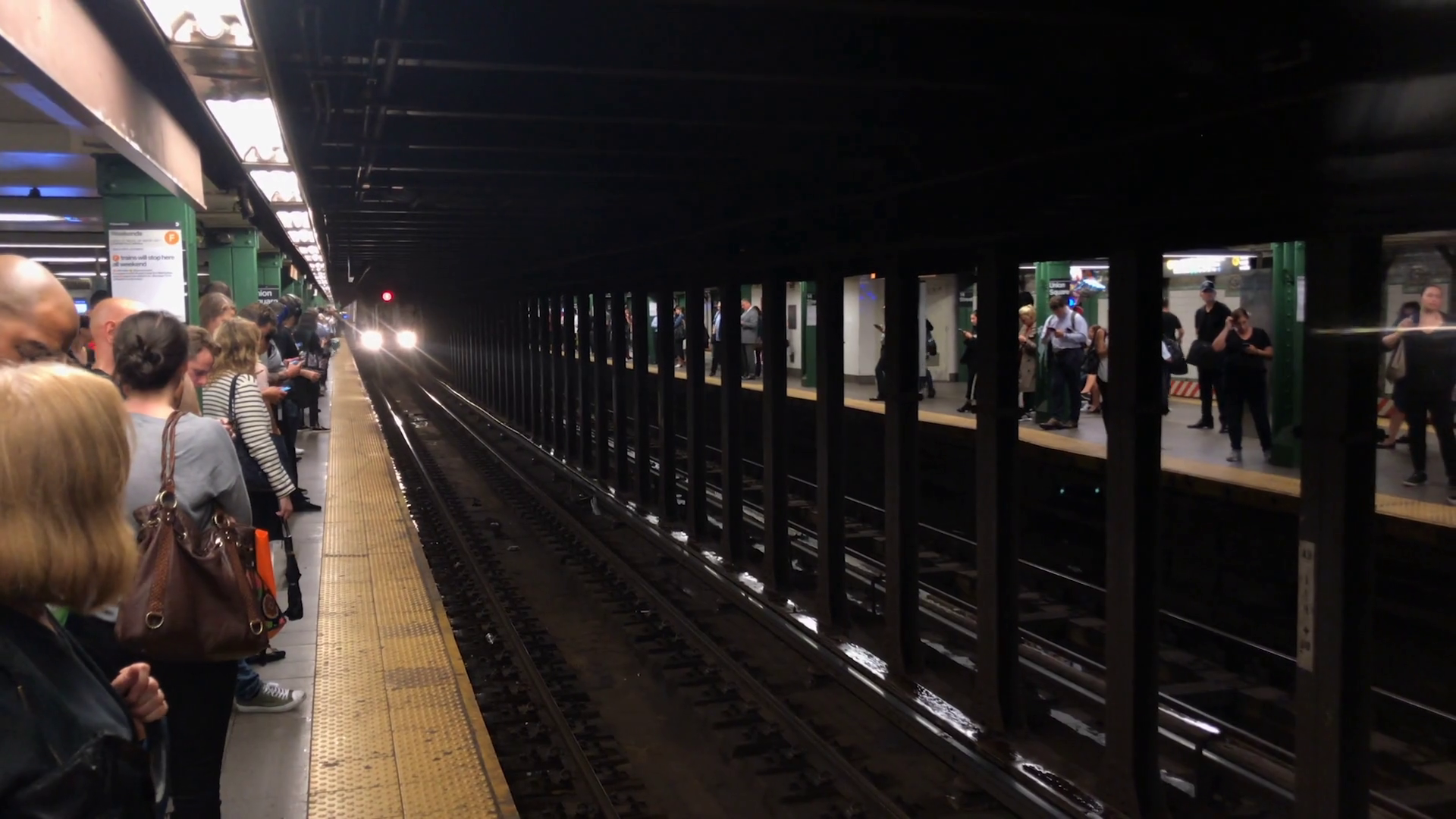 Q train approaching stop in subway station NYC Stock Video Footage 0014 SBV333072992 Storyblocks