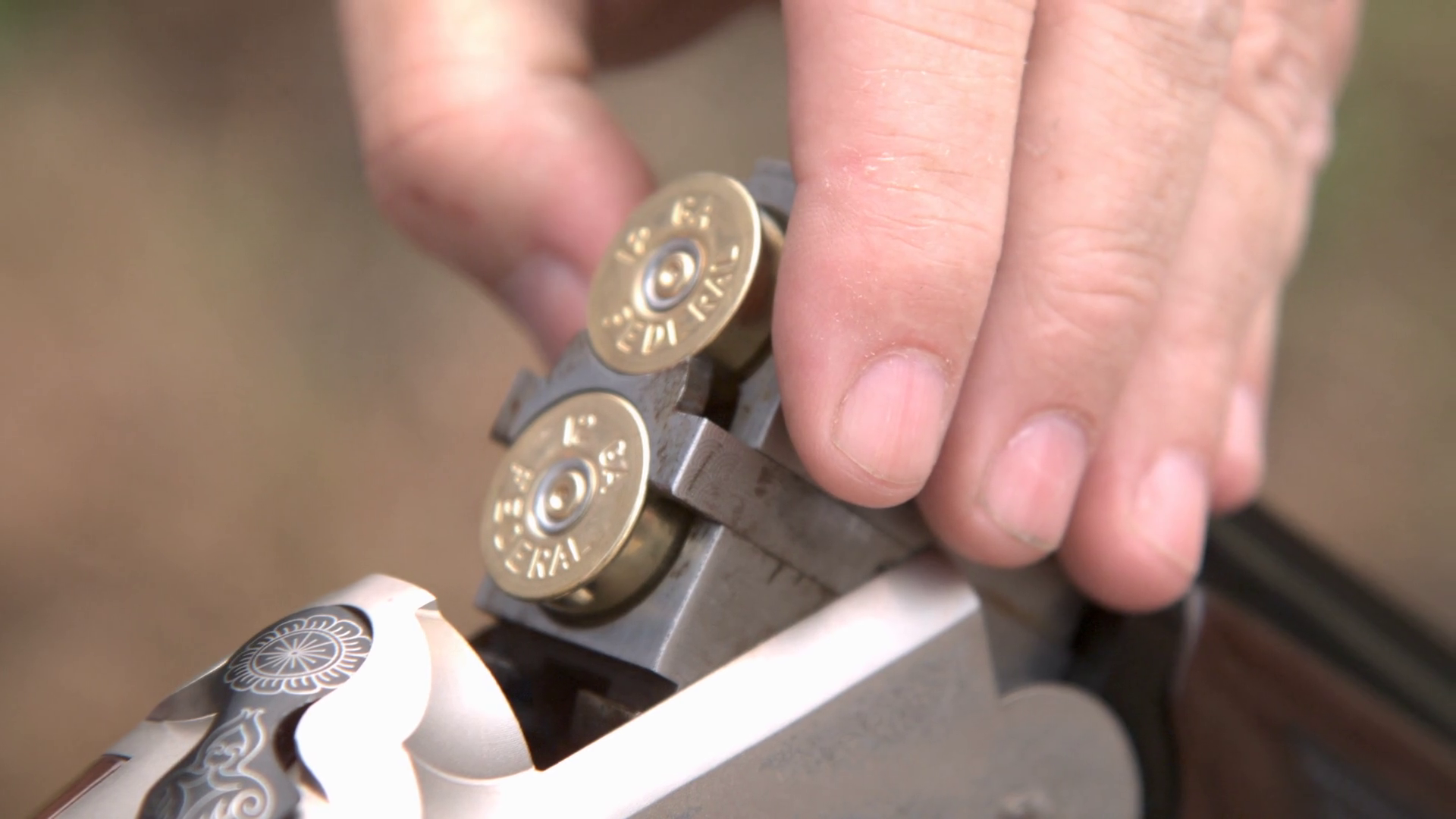 Smoking Barrel Removing Shells From Shotgun Stock Footage SBV338710978