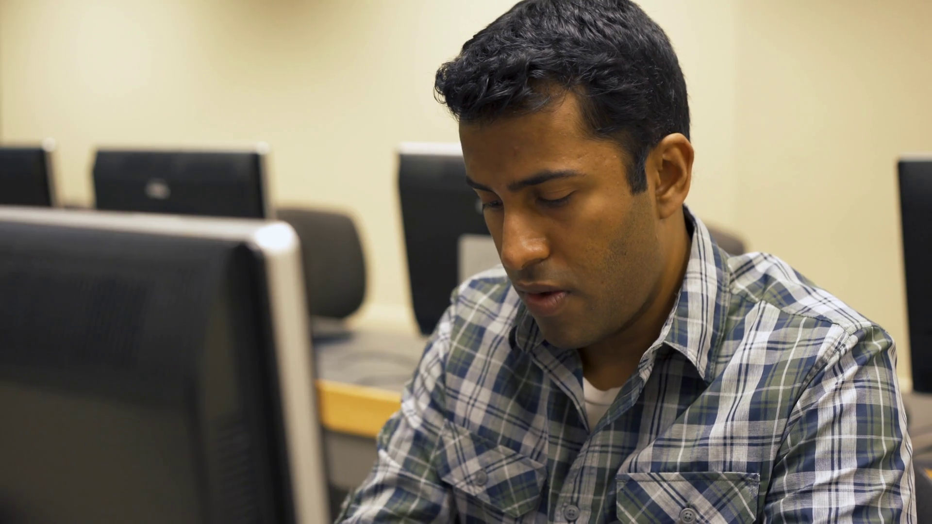 Young Indian Male Working At Computer Workstation In Lab 4k Stock Video 