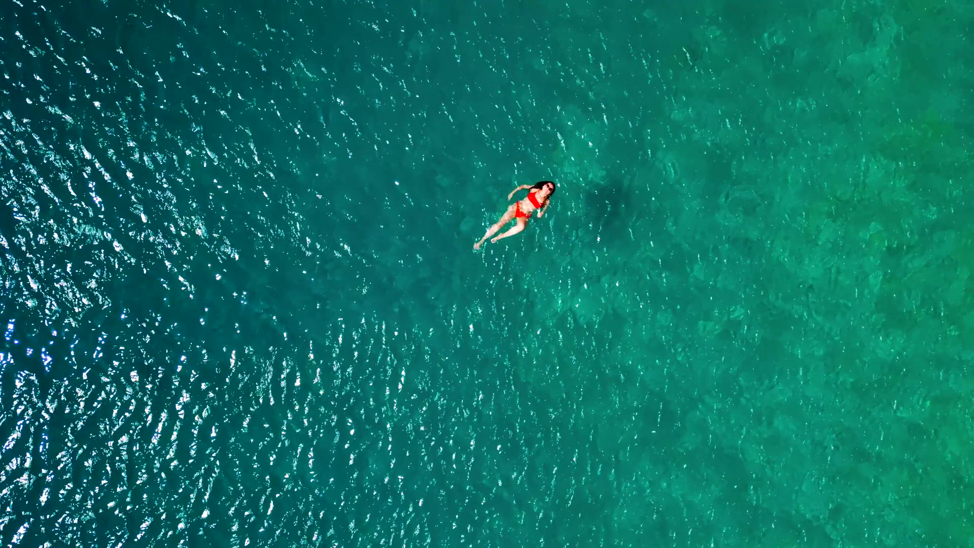 Woman In Red Swimsuit Floats On Back In Stock Footage SBV-351761654 ...