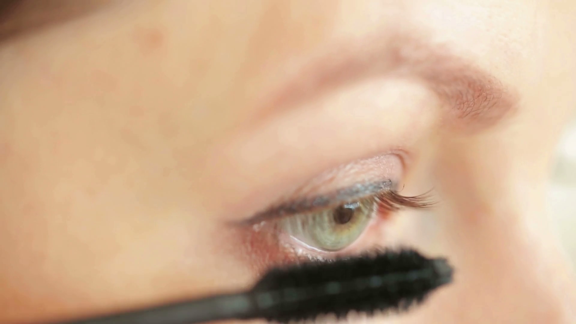 Eye makeup closeup eye pencil and mascara Stock Video Footage 0030