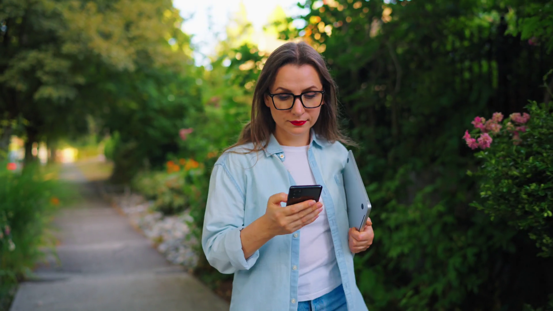 Woman With Laptop Smartphone Walking Through Stock Footage SBV ...
