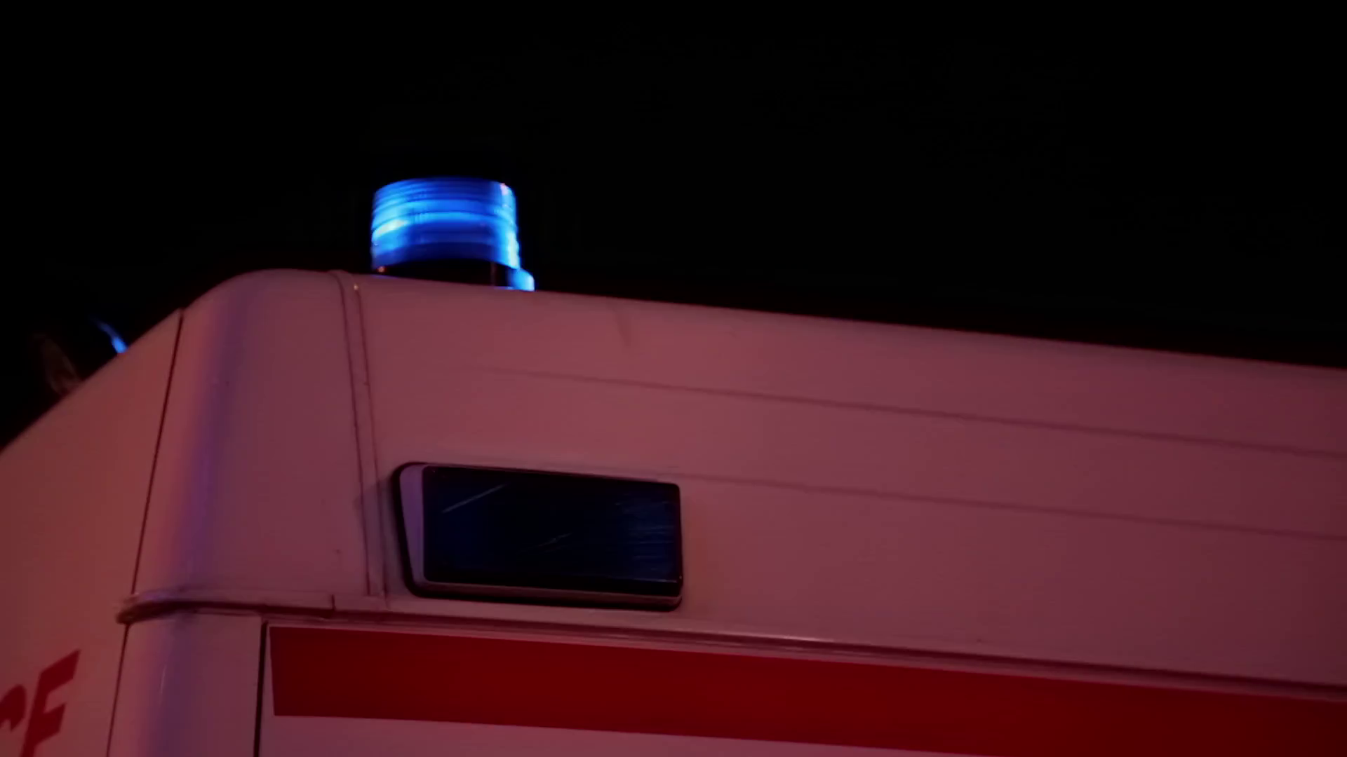 Blue flashing emergency lights on ambulance car Stock Video Footage