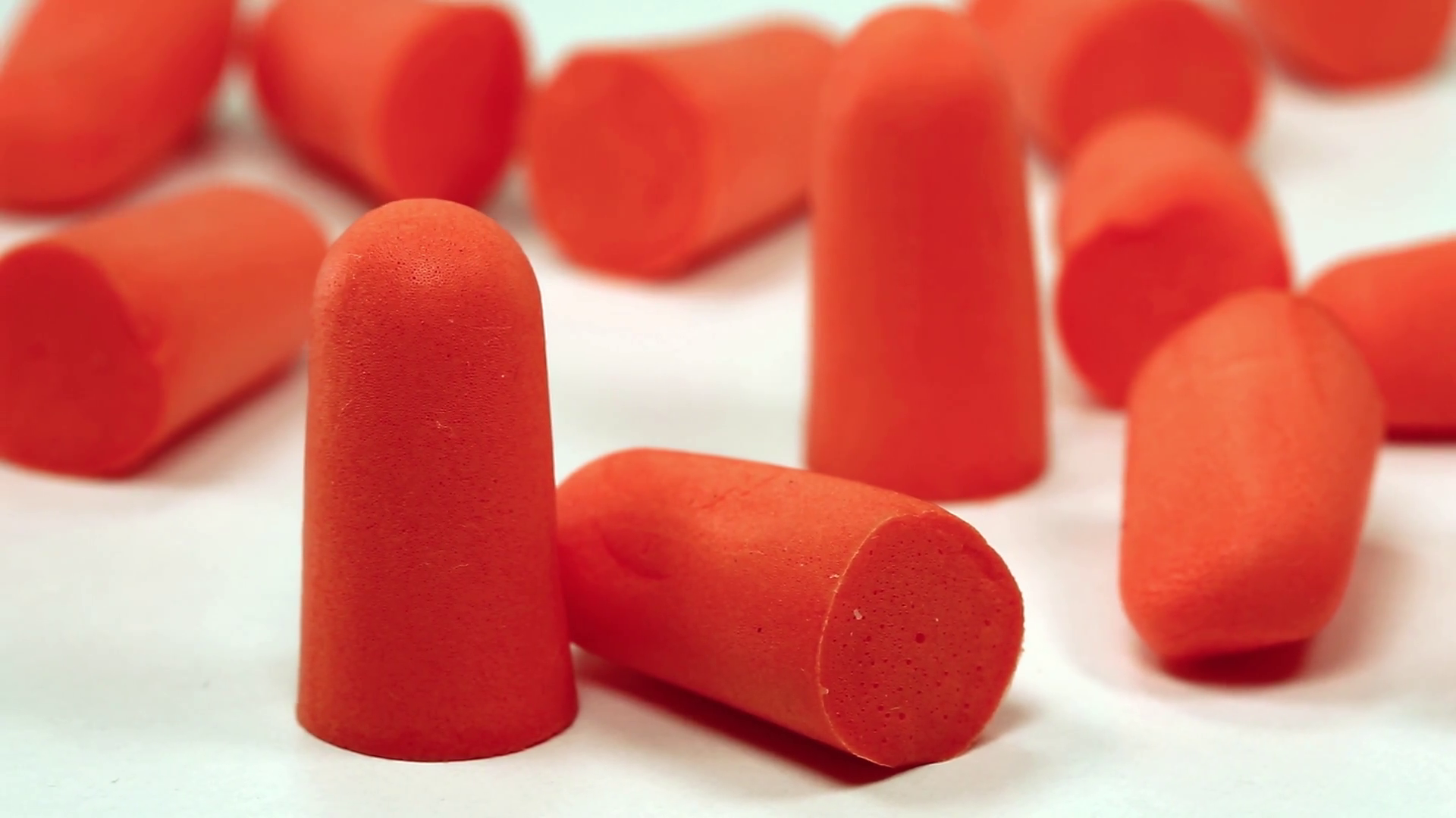 Earplugs offer hearing protection against harmful noise. Red ear plugs