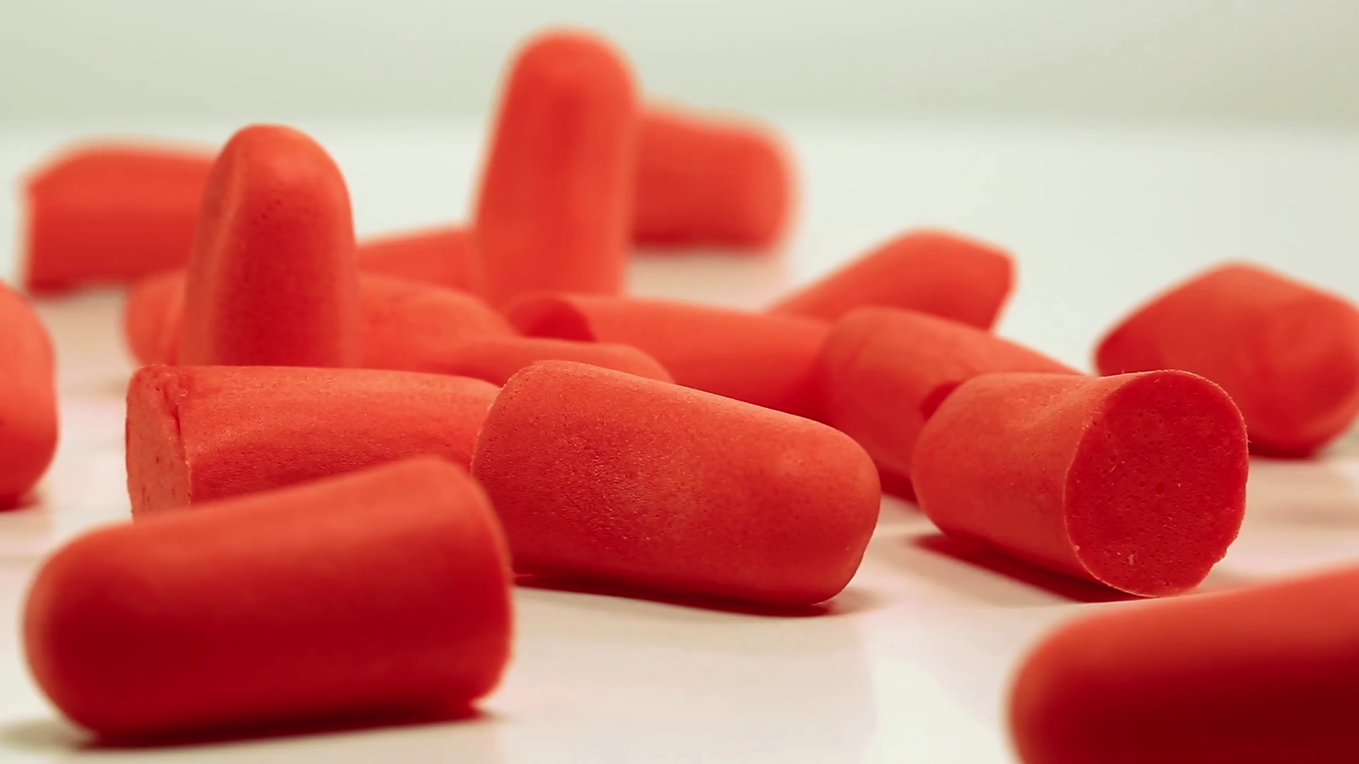 Earplugs offer hearing protection against harmful noise. Red ear plugs