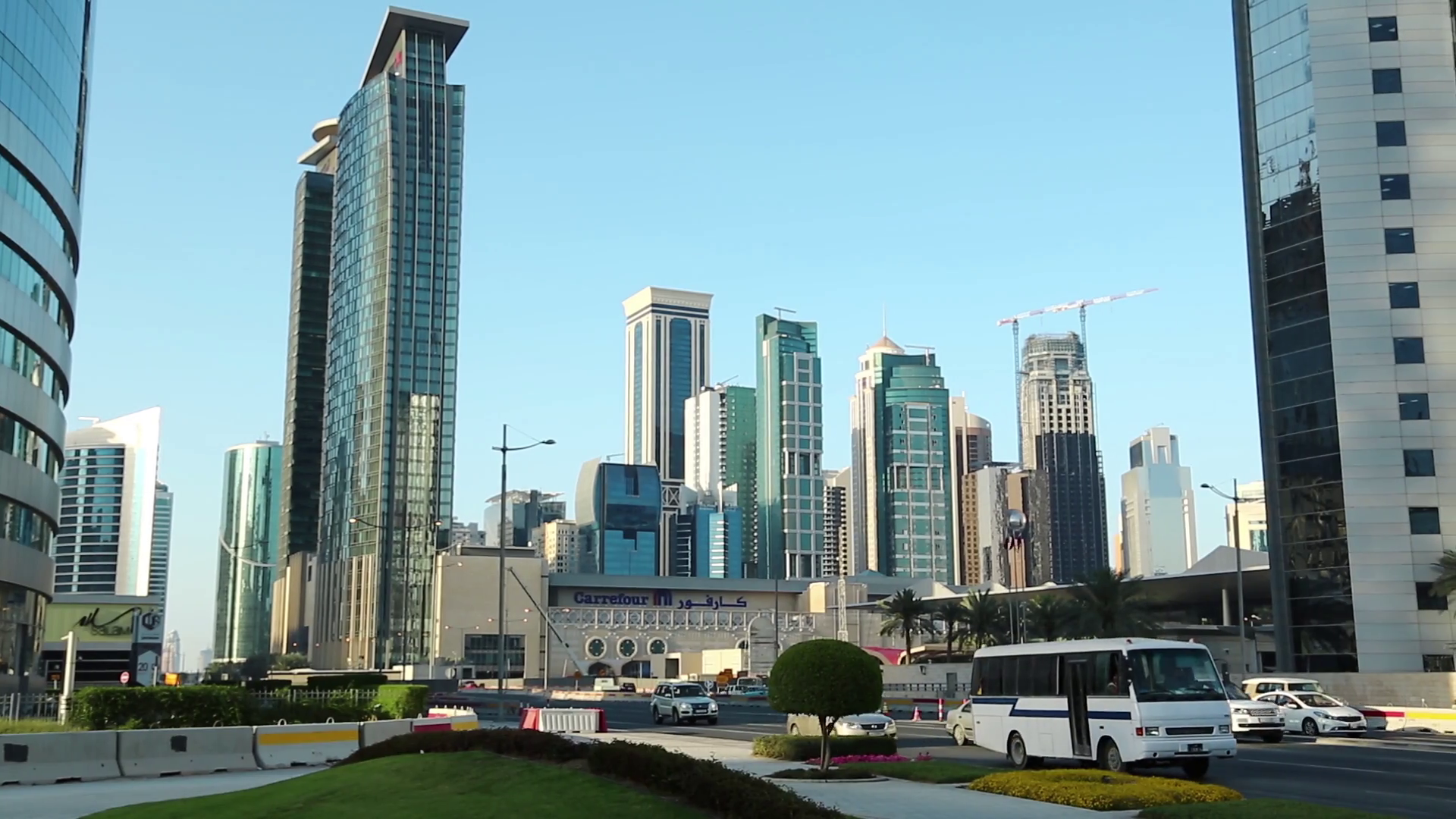 QATAR, DOHA, MARCH 20, 2018 Road traffic near Carrefour supermarket in