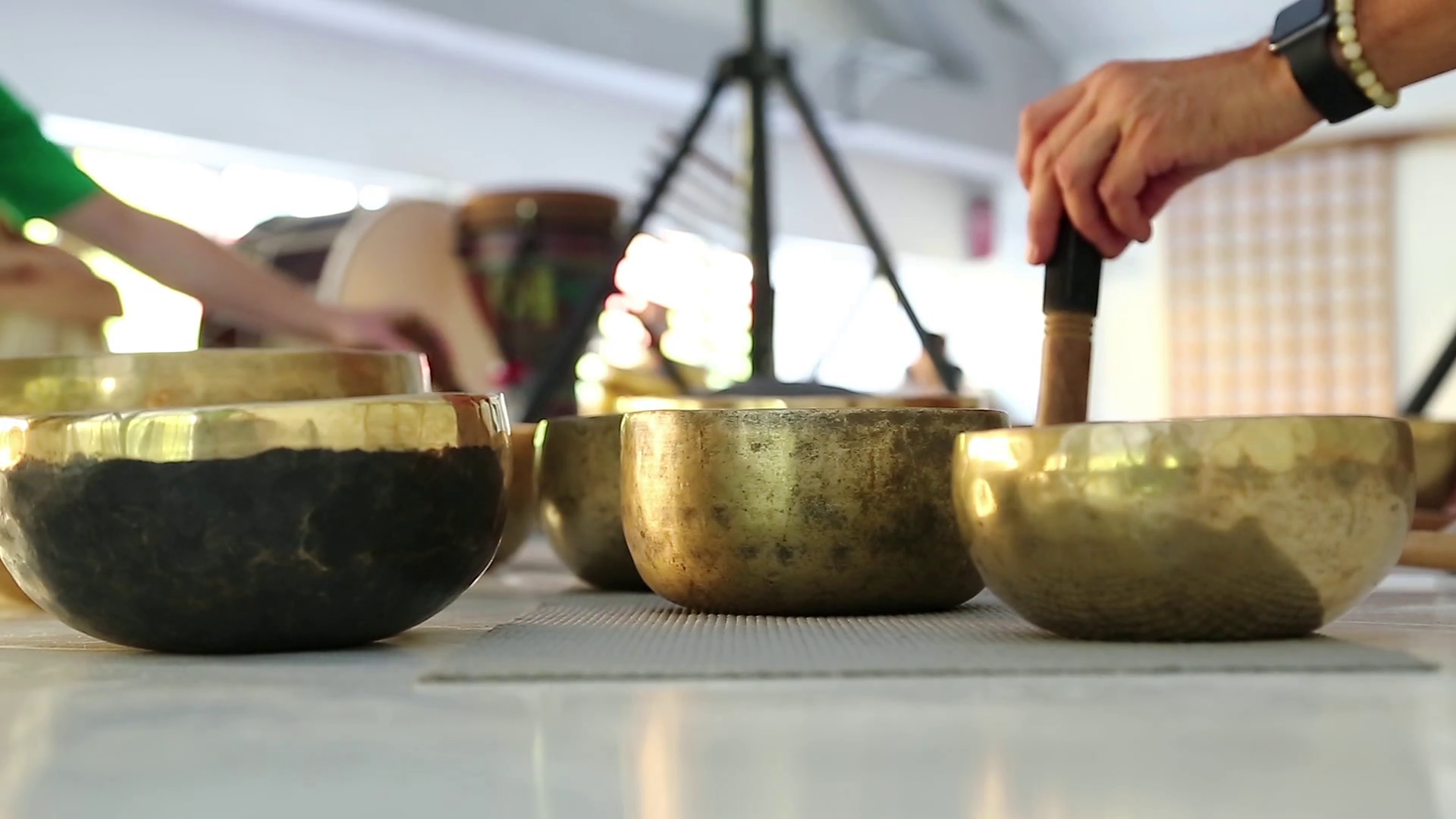 Tibetan singing bowls, musical group plays on Tibetan singing bowls