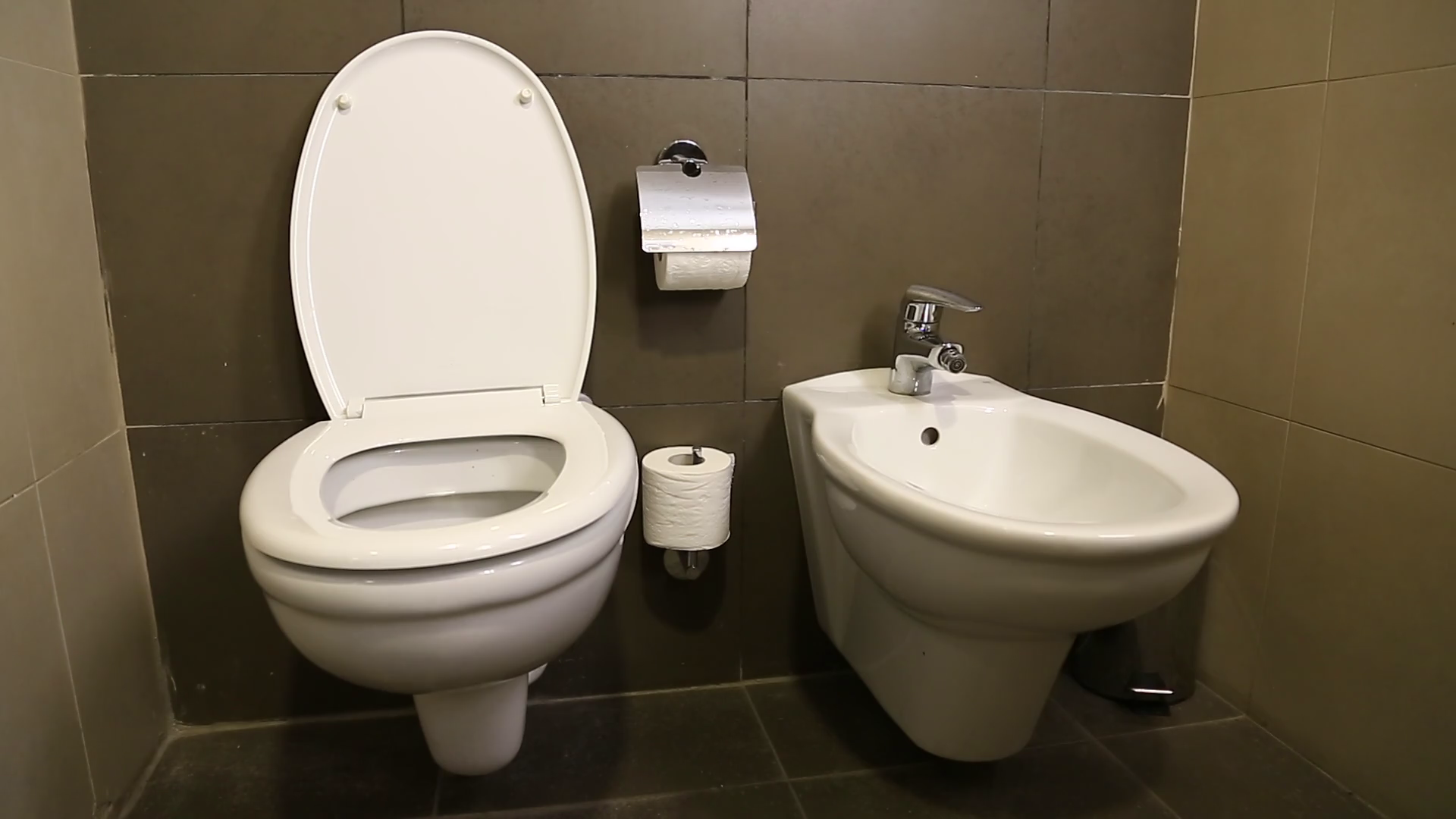 Toilet bowl with water and tissue. Toilet sink and bidet Stock Video Footage Storyblocks