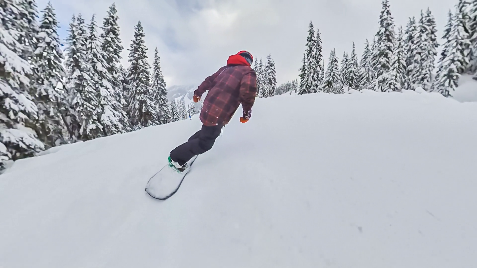 Man snowboarding down a mountain slope Stock Video Footage Storyblocks