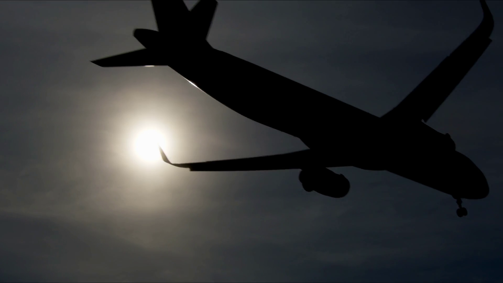 Backlit Airplane Silhouettes Landing During Stock Footage SBV-352018080 ...