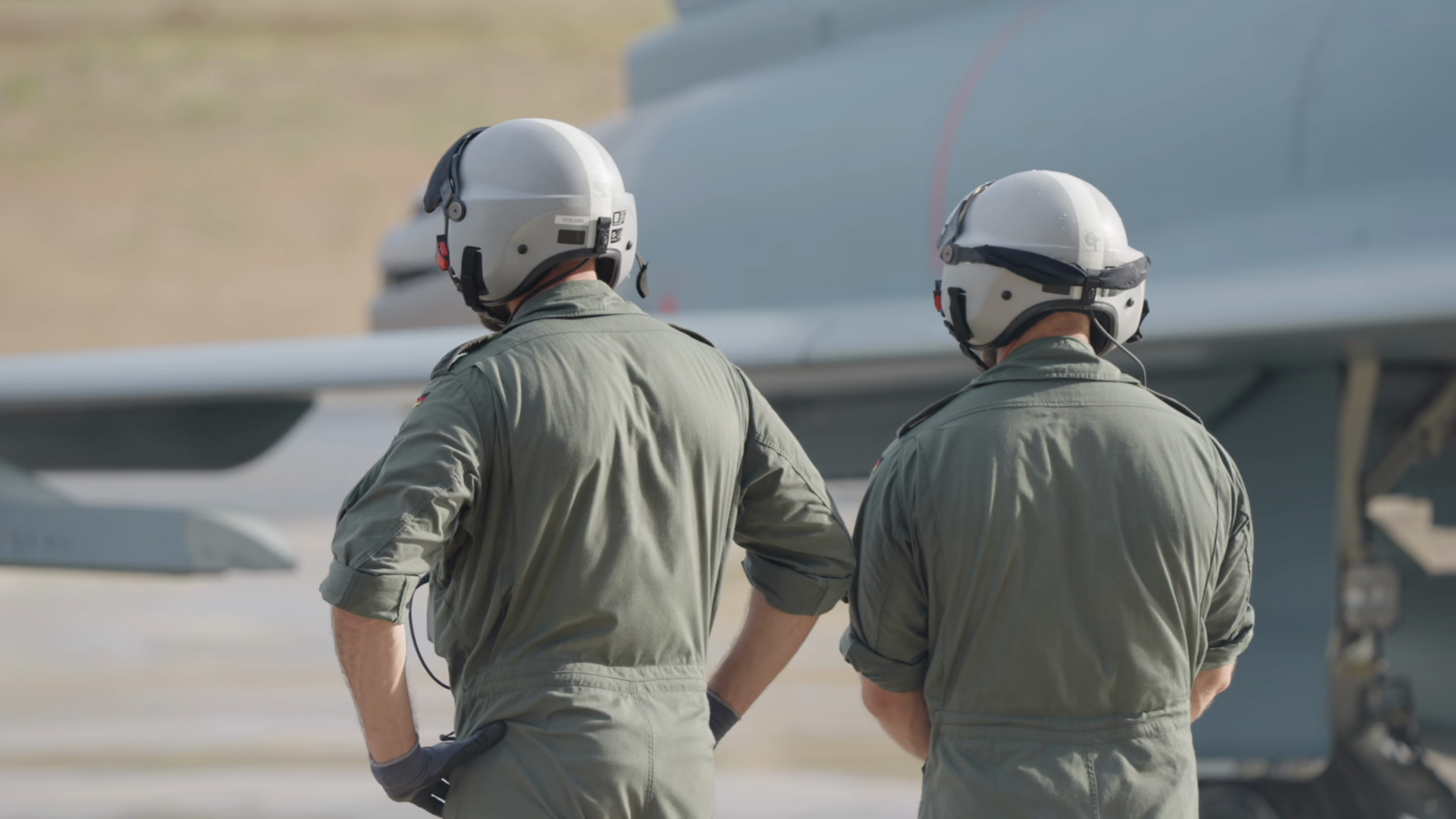 Rear View Of Two Pilots In Flight Gear Stock Footage SBV-353512311 ...