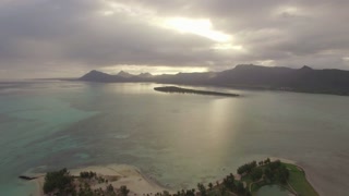 Aerial scene with distant mountain ranges on Mauritius Island and view to the Indian Ocean
