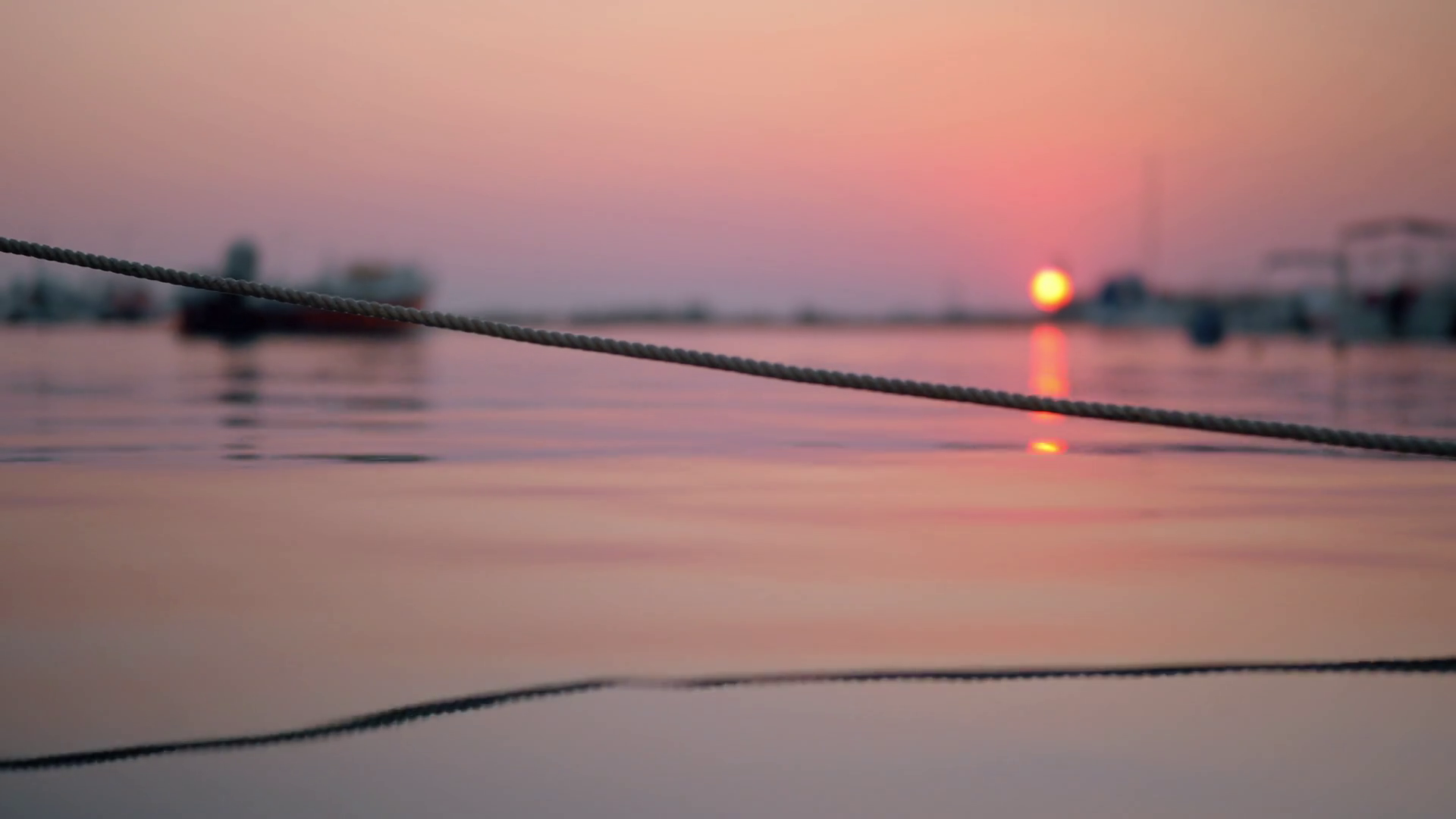 Rope In Water Tied Up To Boat In Harbour Stock Footage SBV338003406