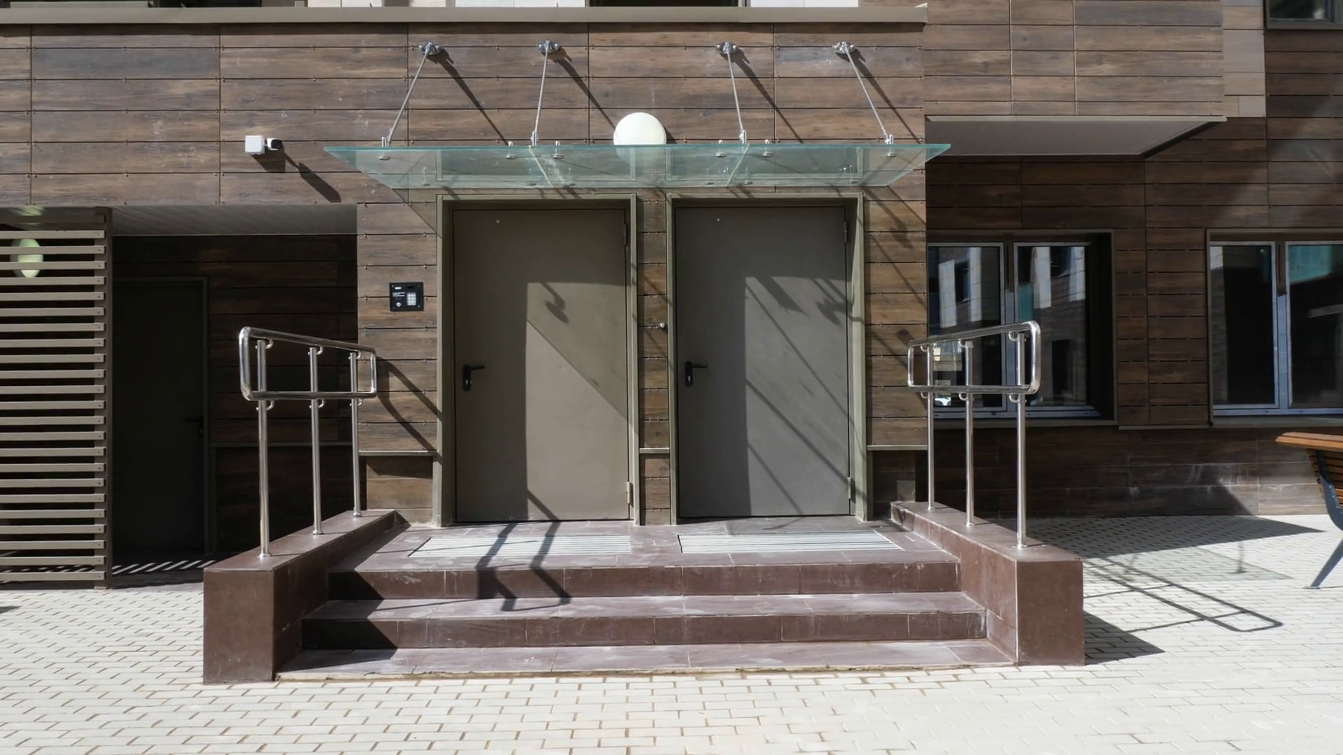 Tilt shot of newbuilt highrise modern apartment house. View from the