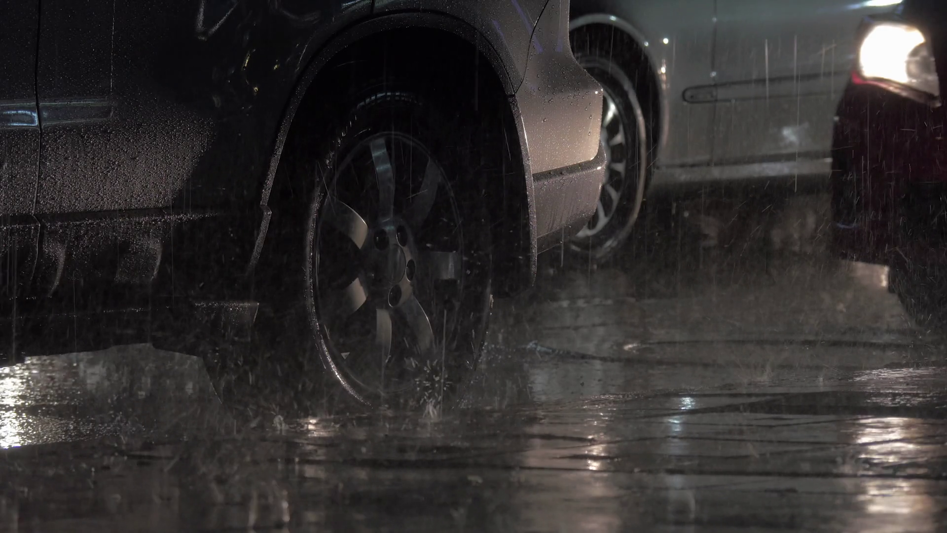 Two Cars Parked At Roadside Under Heavy Rain Stock Footage SBV ...