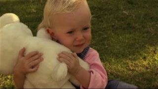Baby in Park with teddy bear