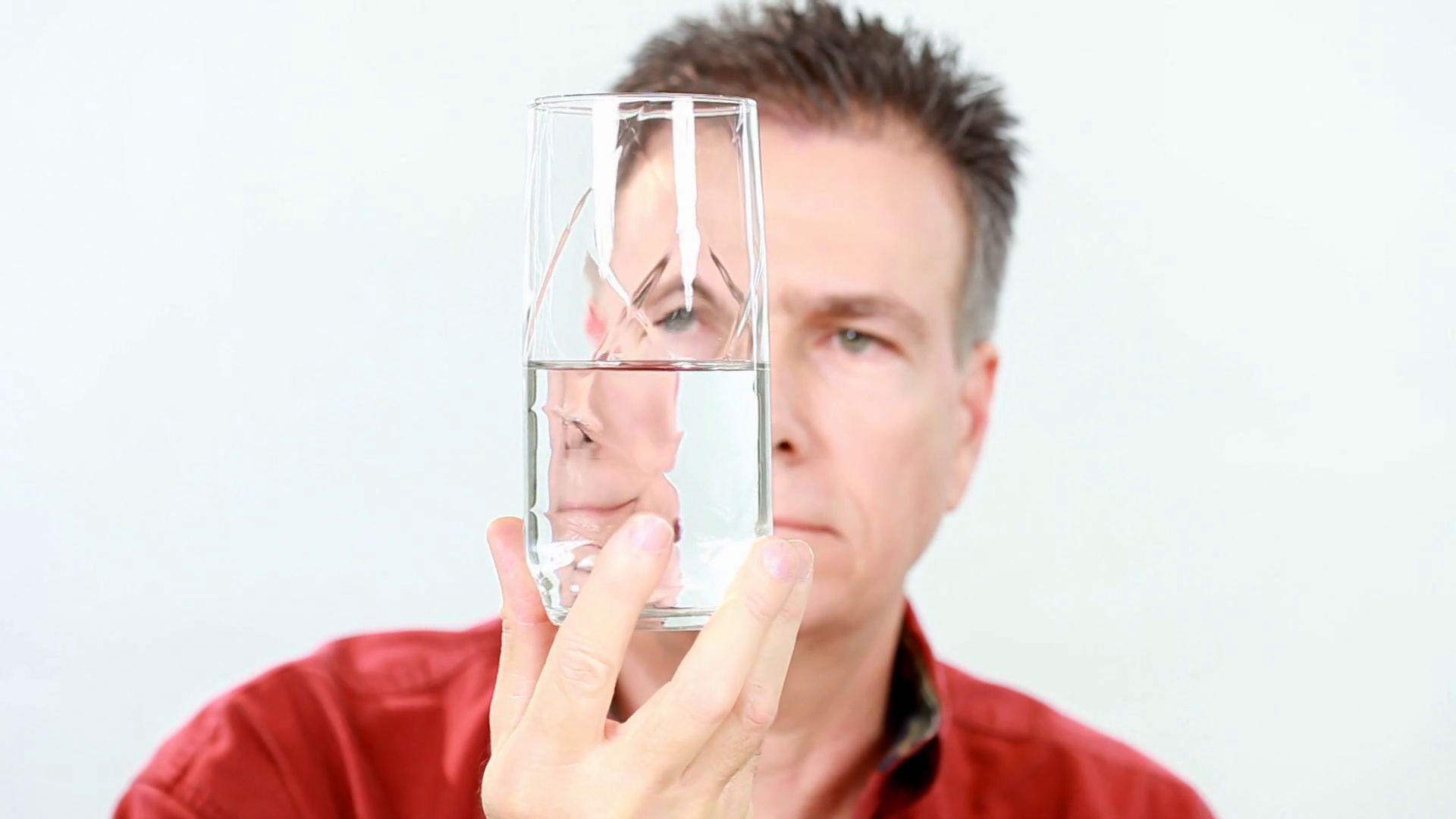 Man Looking At Glass Half Full Stock Footage SBV301088065 Storyblocks
